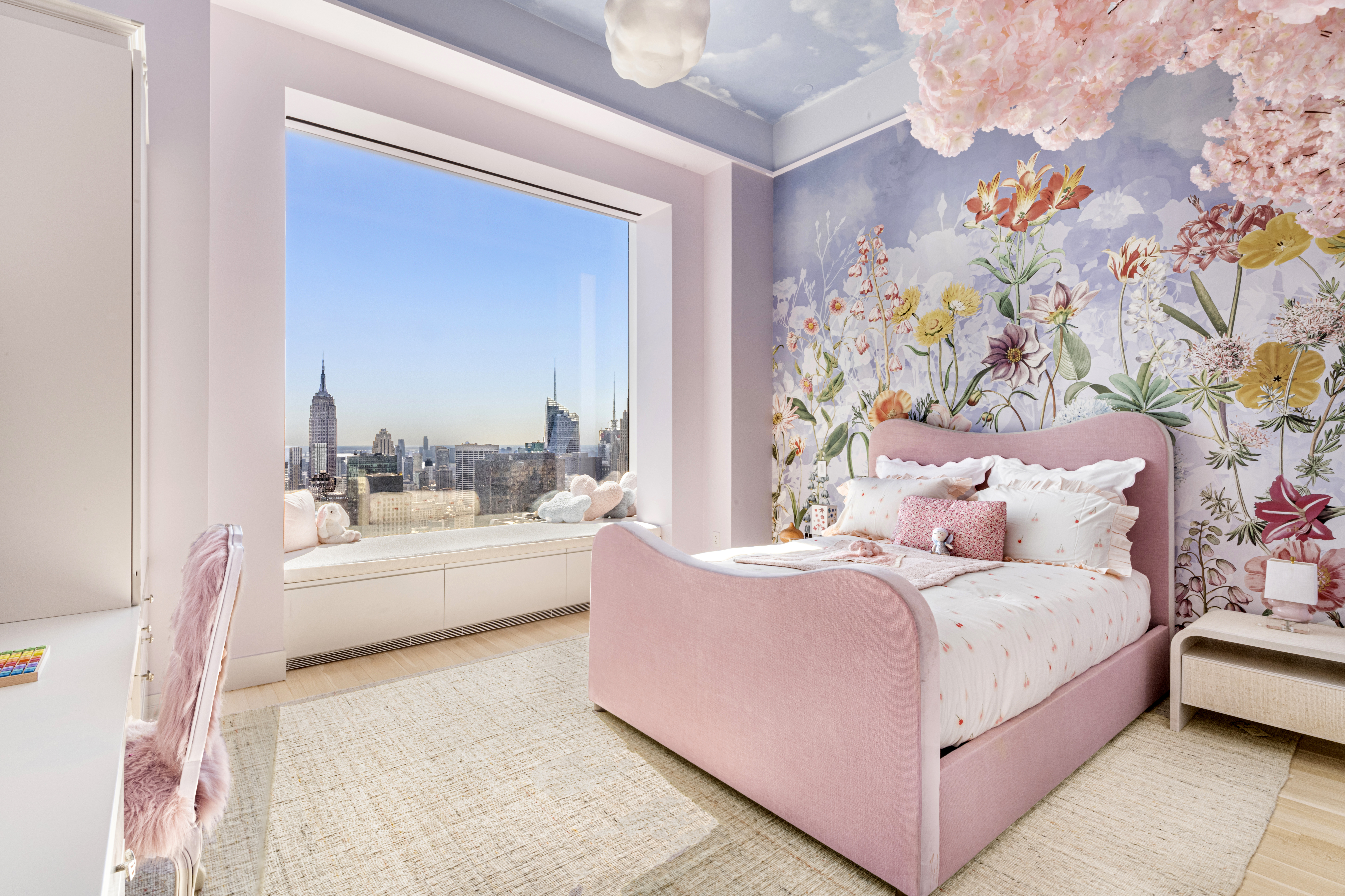 432 Park Avenue, Unit 55A Manhattan, NY 10022 - Photo 8 of 13 a bedroom with a bed and a couch