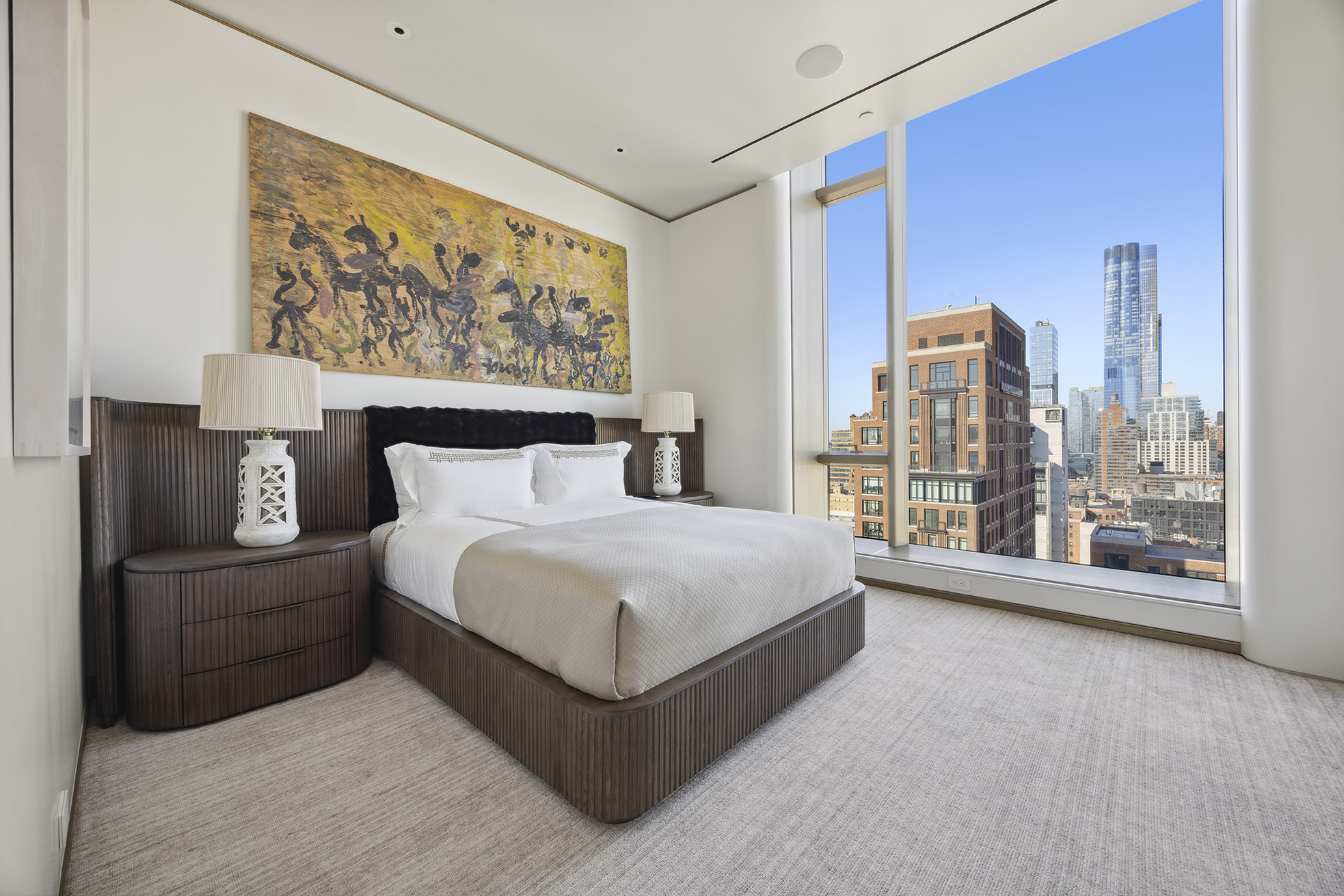 551 West 21st Street, Unit PH Manhattan, NY 10011 - Photo 36 of 51 a spacious bedroom with a large bed and a large window