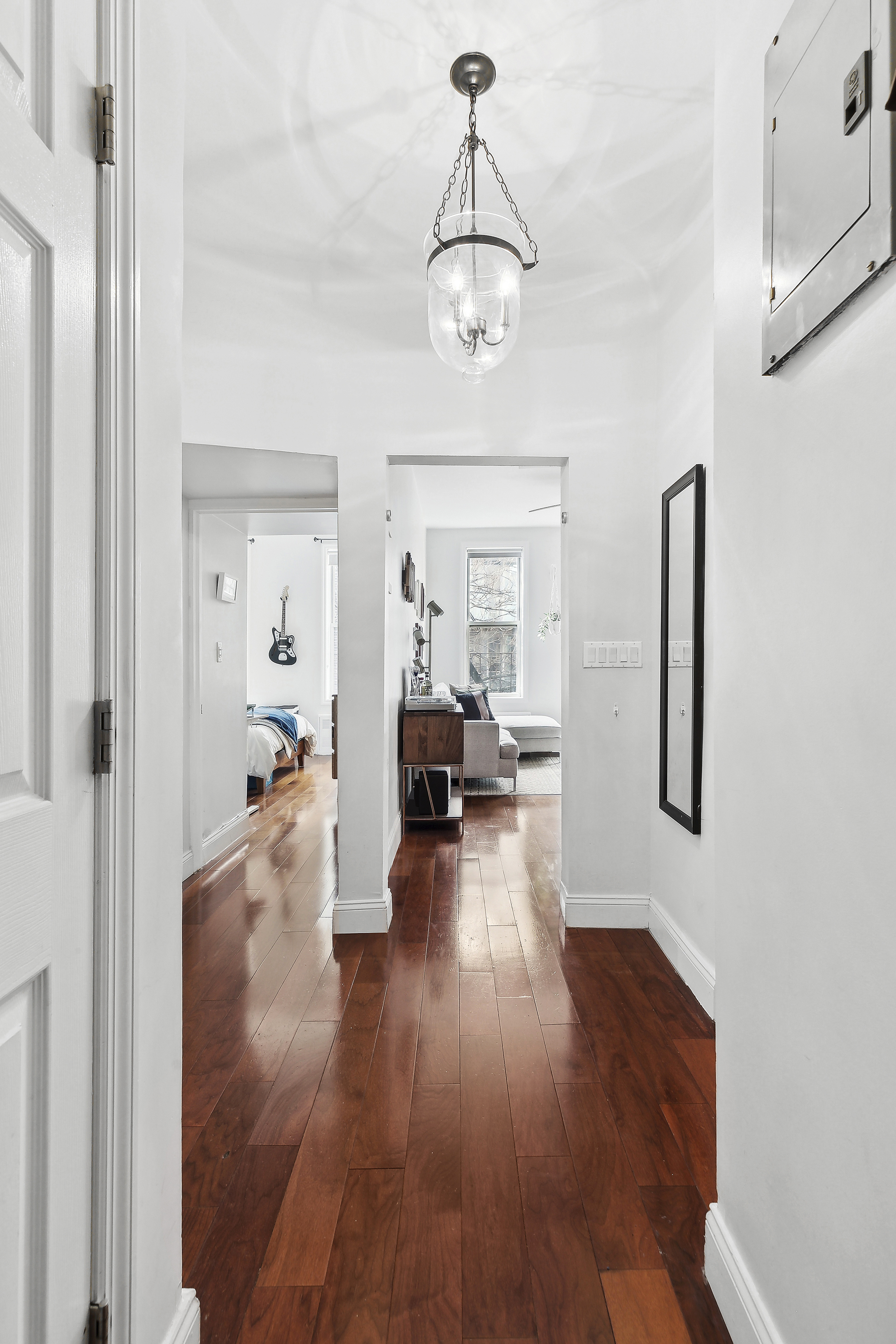 406 West 46th Street, Unit 4C Manhattan, NY 10036 - Photo 2 of 9 a view of livingroom with furniture and wooden floor