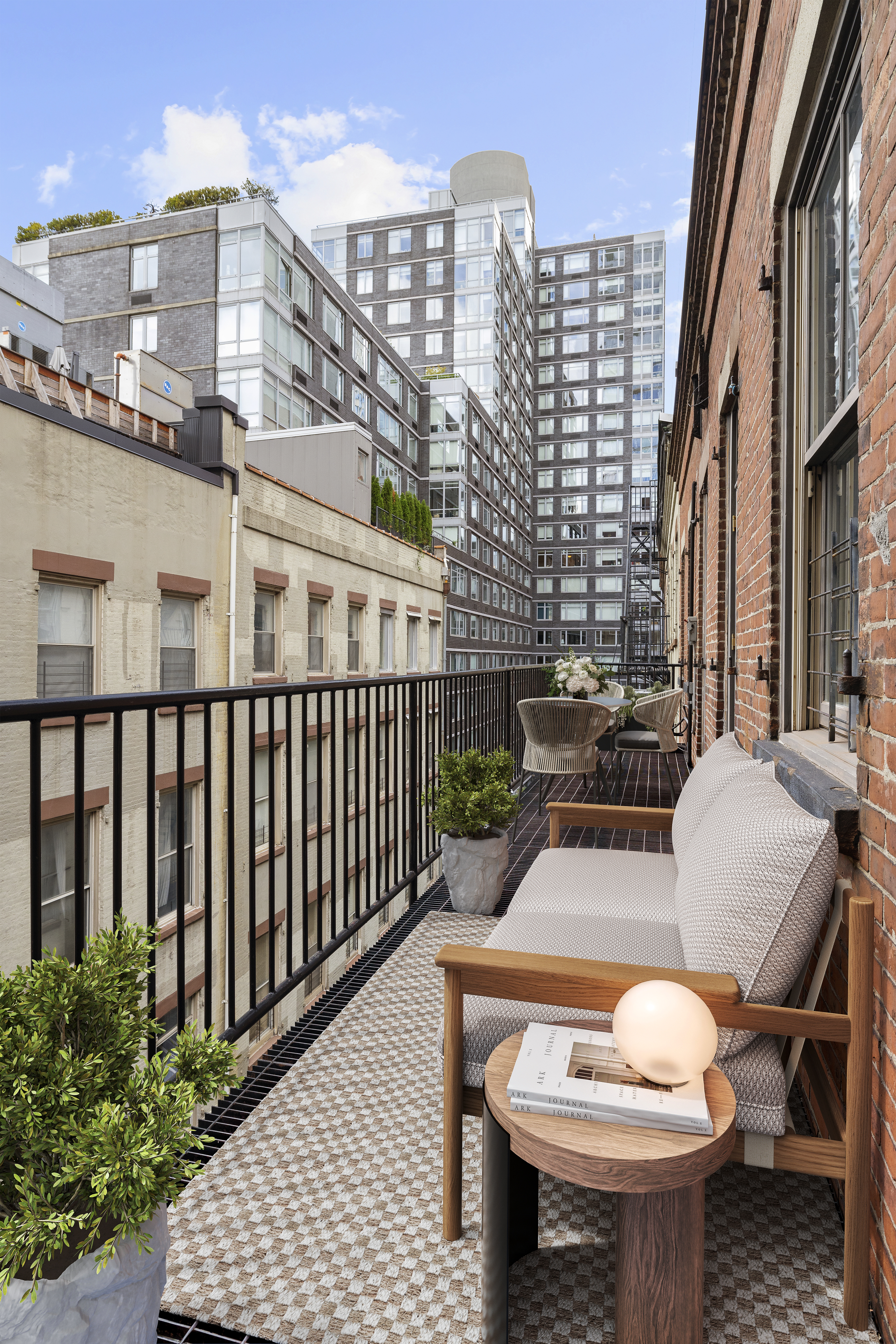 73 Worth Street, Unit 5E Manhattan, NY 10013 - Photo 8 of 10 a view of a balcony with furniture