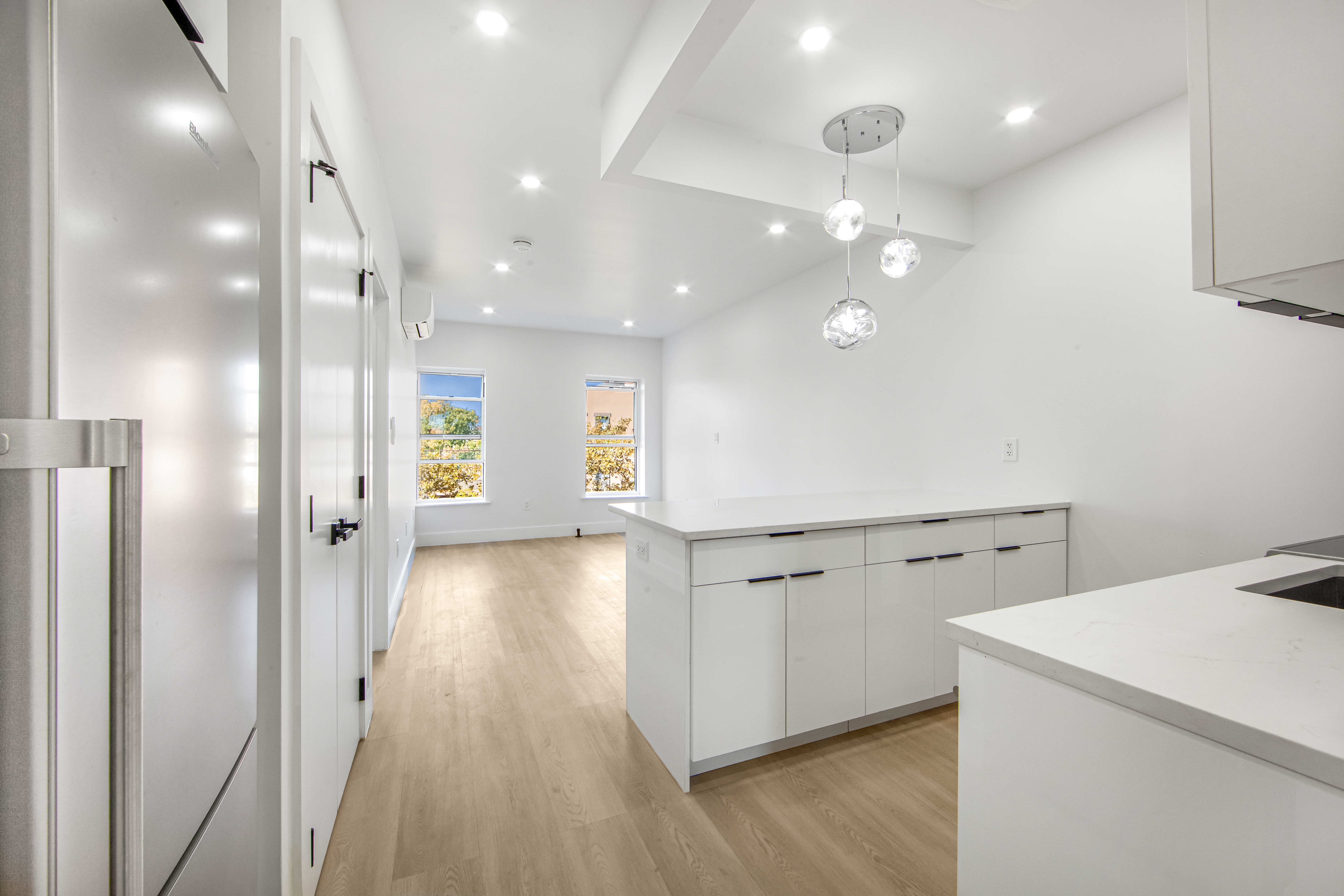 433 Court Street, Unit PH3 Brooklyn, NY 11231 - Photo 5 of 14 a view of a hallway with wooden floor