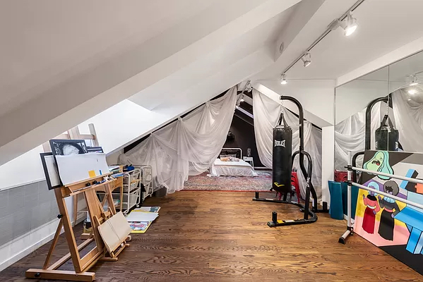 210 West 16th Street, Unit PH Manhattan, NY 10011 - Photo 11 of 16 a view of a room with gym equipment
