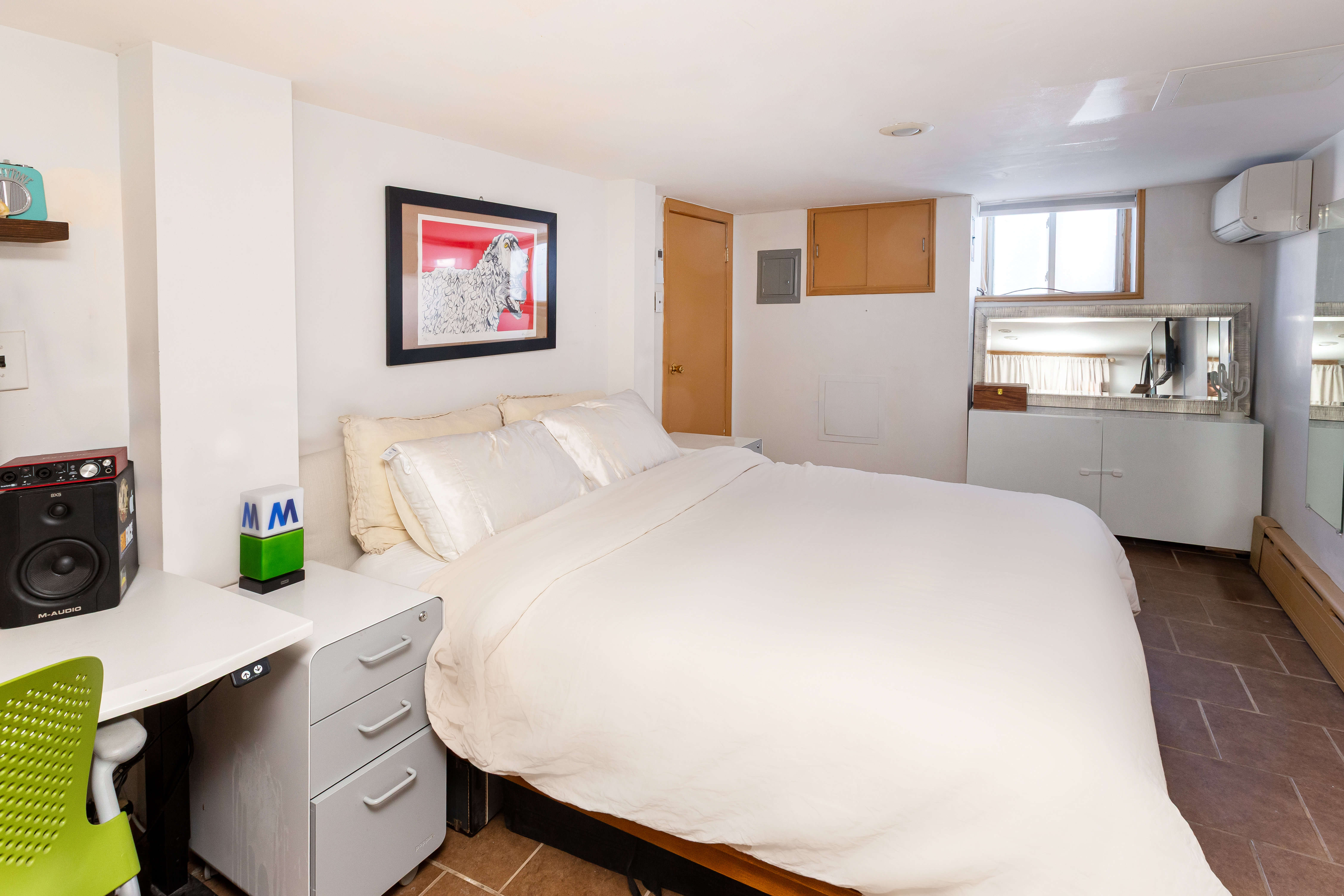 214 Eagle Street Brooklyn, NY 11222 - Photo 16 of 22 a bedroom with a bed and a view of kitchen