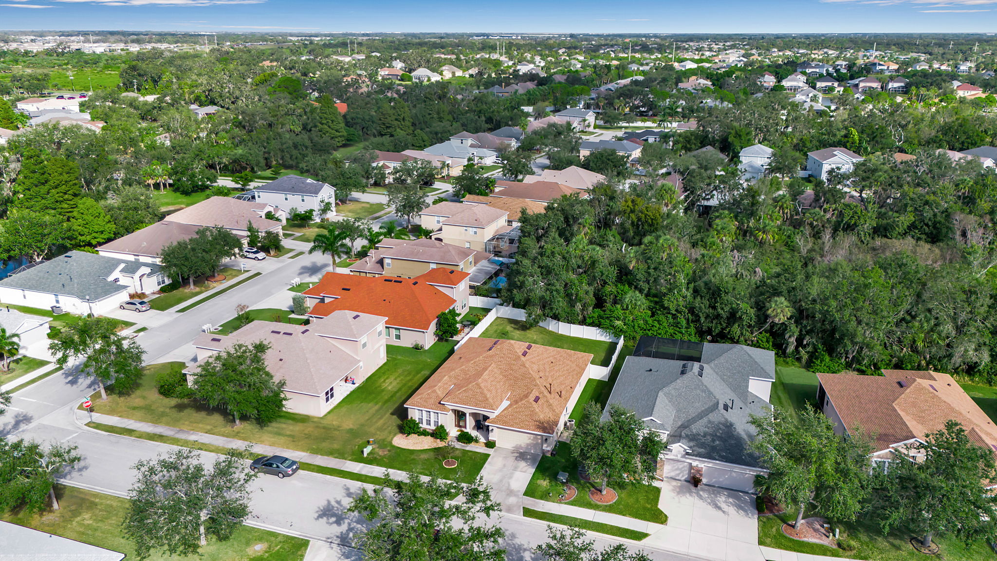 6106 34th Court East Bradenton, FL 34203 - Photo 64 of 69 an aerial view of residential houses with outdoor space and trees