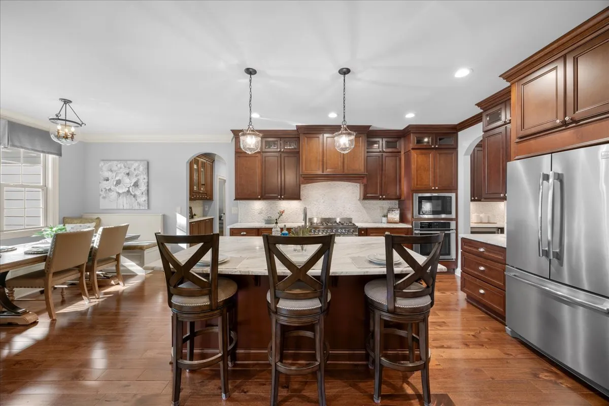 a spacious bathroom with a sink double vanity and a mirror