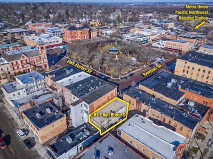 an aerial view of a city with lots of residential buildings