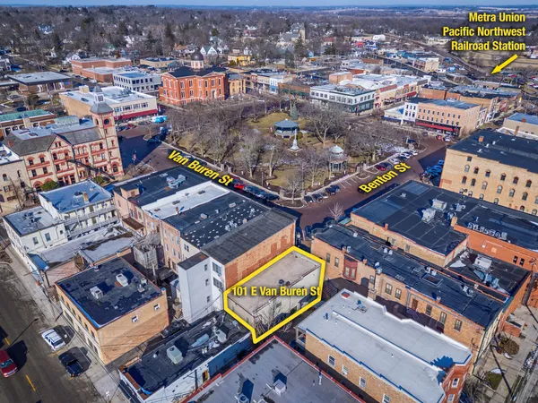 an aerial view of a city with lots of residential buildings