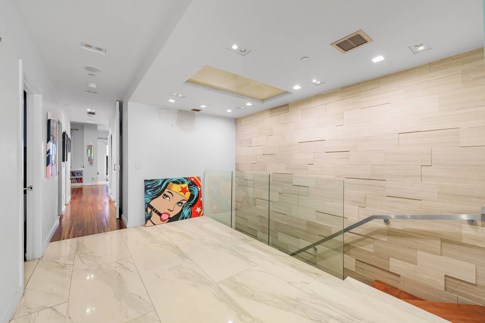 124 East 13th Street, Unit 3 Manhattan, NY 10003 - Photo 15 of 26 a view of a hallway with wooden floor