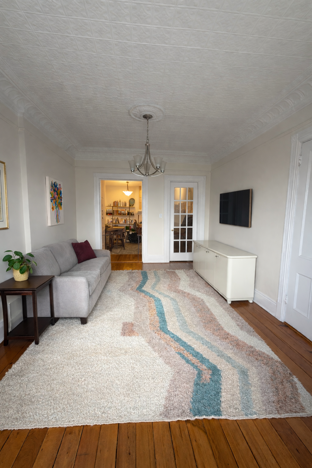 481 9th Street, Unit 4 Brooklyn, NY 11215 - Photo 2 of 33 a living room with furniture and a flat screen tv