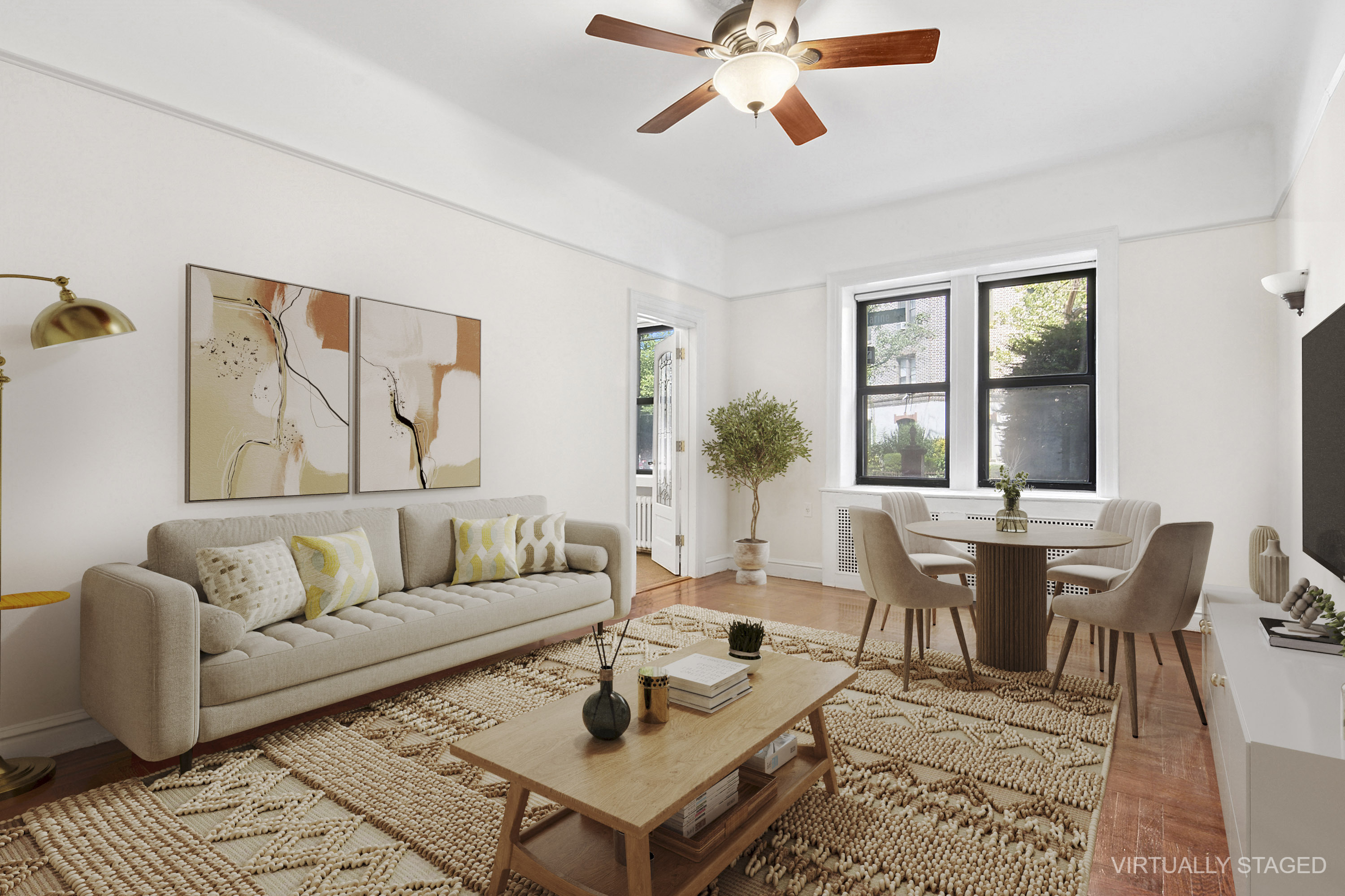 2 Marine Avenue, Unit 1B Brooklyn, NY 11209 - Photo 1 of 14 a living room with furniture and a large window