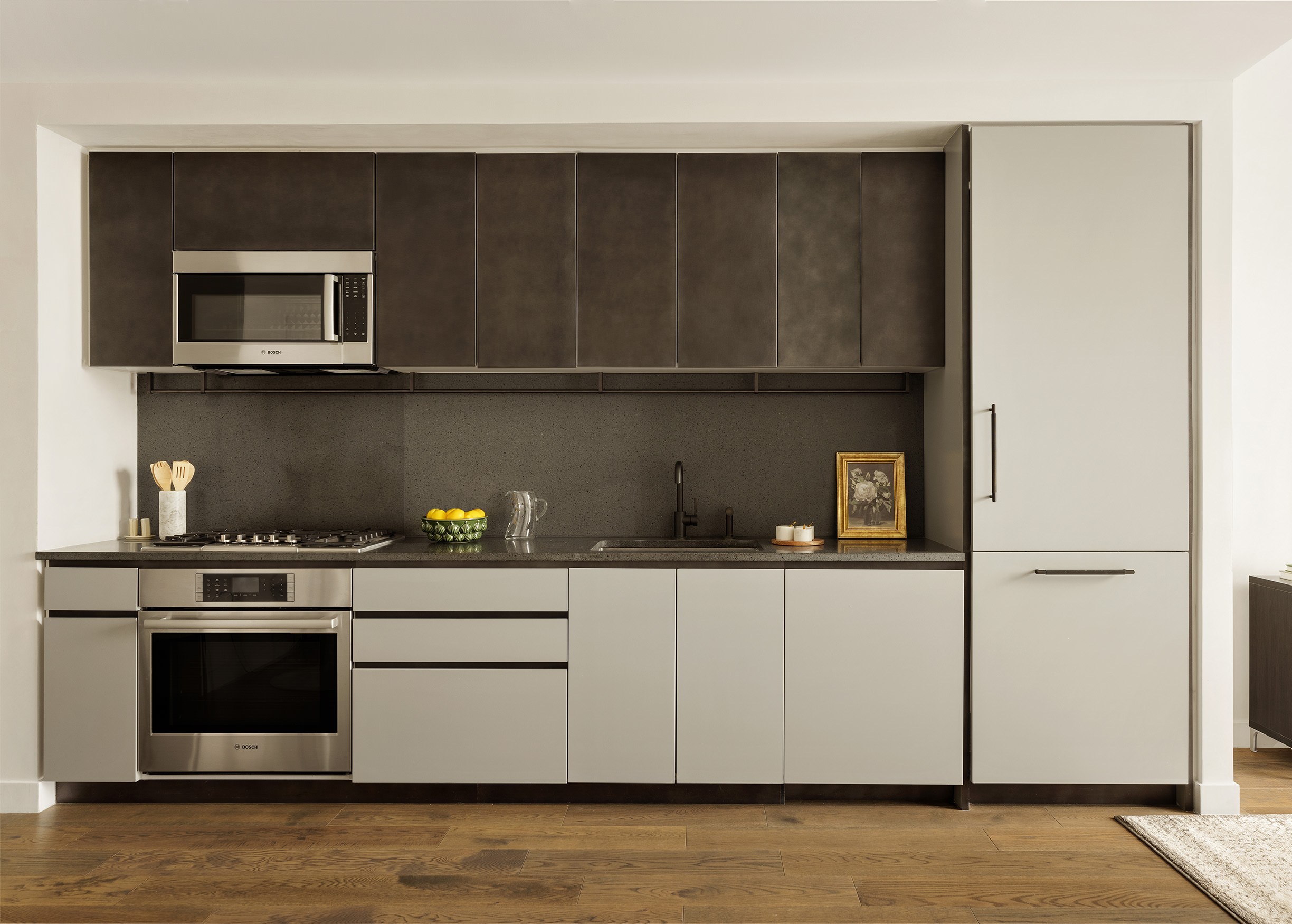11 Hoyt Street, Unit 43E Brooklyn, NY 11201 - Photo 4 of 10 a kitchen with stainless steel appliances granite countertop a stove and a microwave
