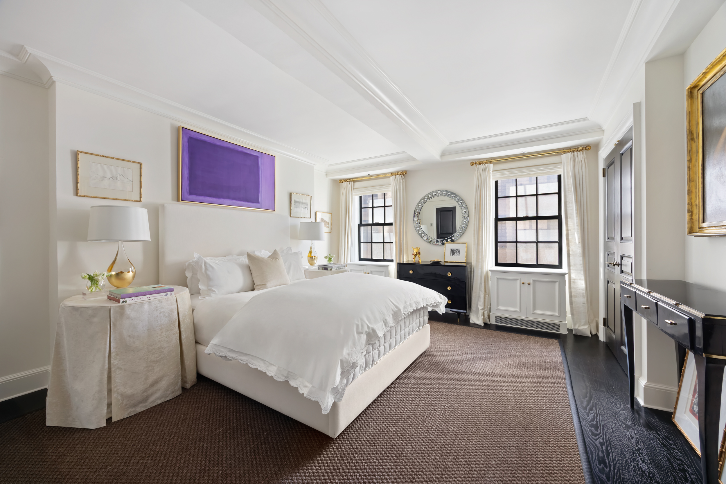 170 East 78th Street, Unit 8E Manhattan, NY 10075 - Photo 11 of 16 a bed room with a bed and a tv