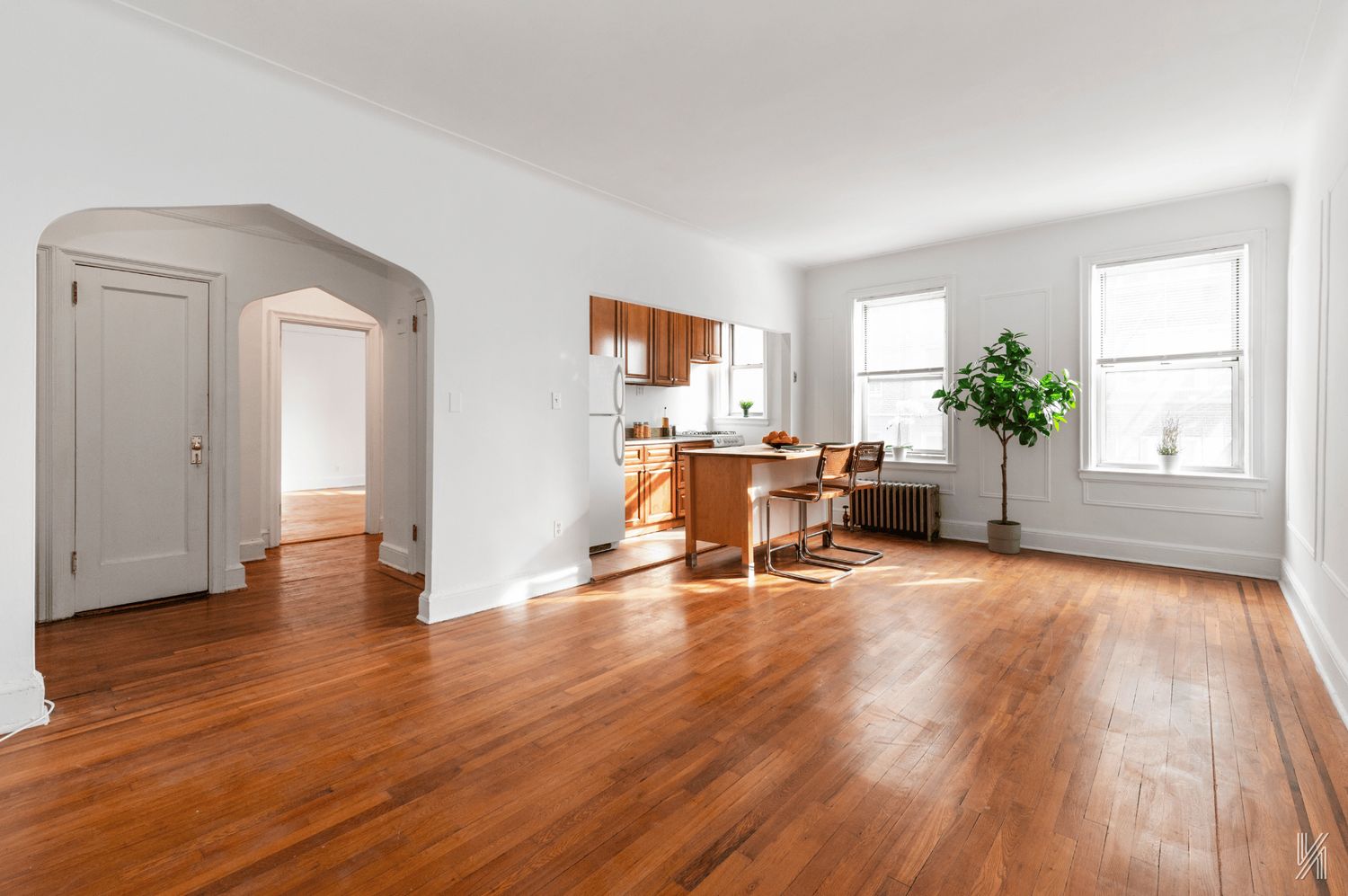 59-11 Queens Boulevard, Unit 3J Queens, NY 11377 - Photo 1 of 18 a living room with furniture and a wooden floor