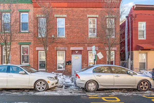 a car parked in front of a building