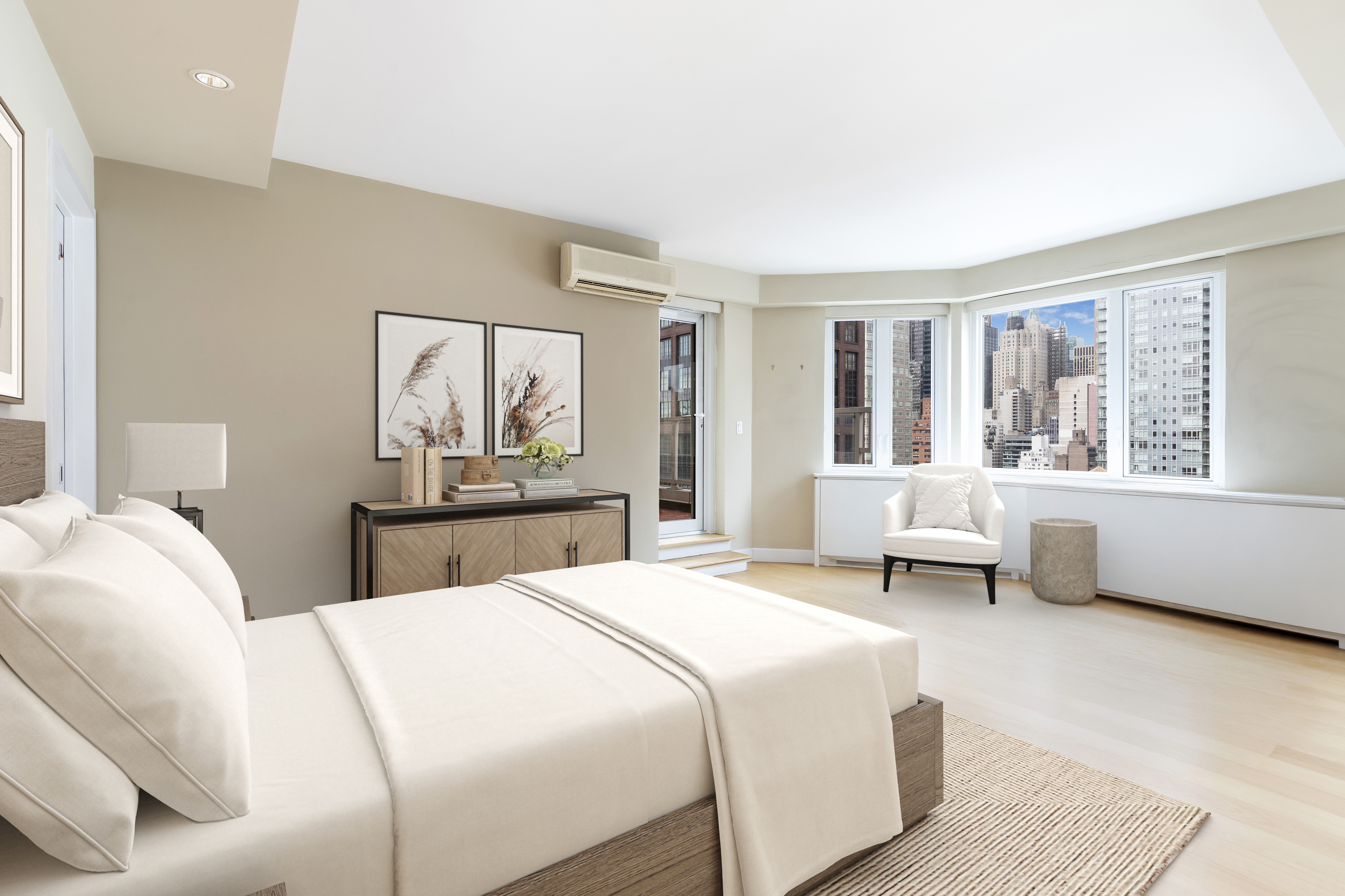 411 East 53rd Street, Unit 19D Manhattan, NY 10022 - Photo 10 of 13 a bedroom with a large bed and a window