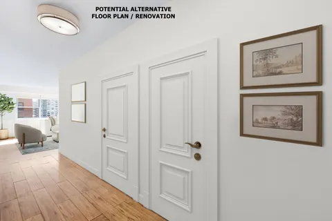a view of room with furniture and wooden floor