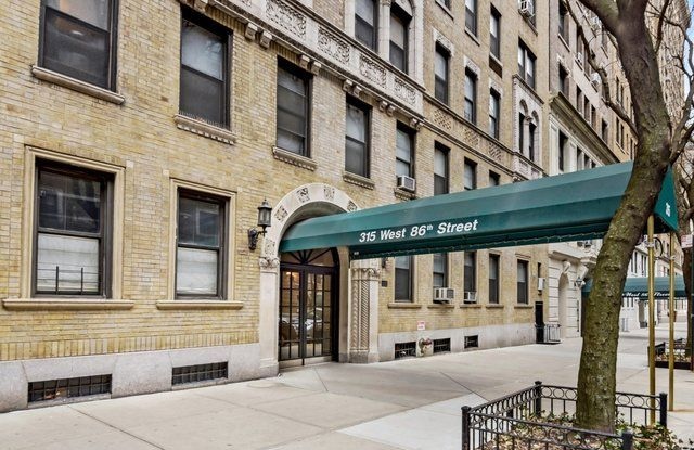 315 West 86th Street, Unit 14C Manhattan, NY 10024 - Photo 12 of 13 a view of a building with a porch