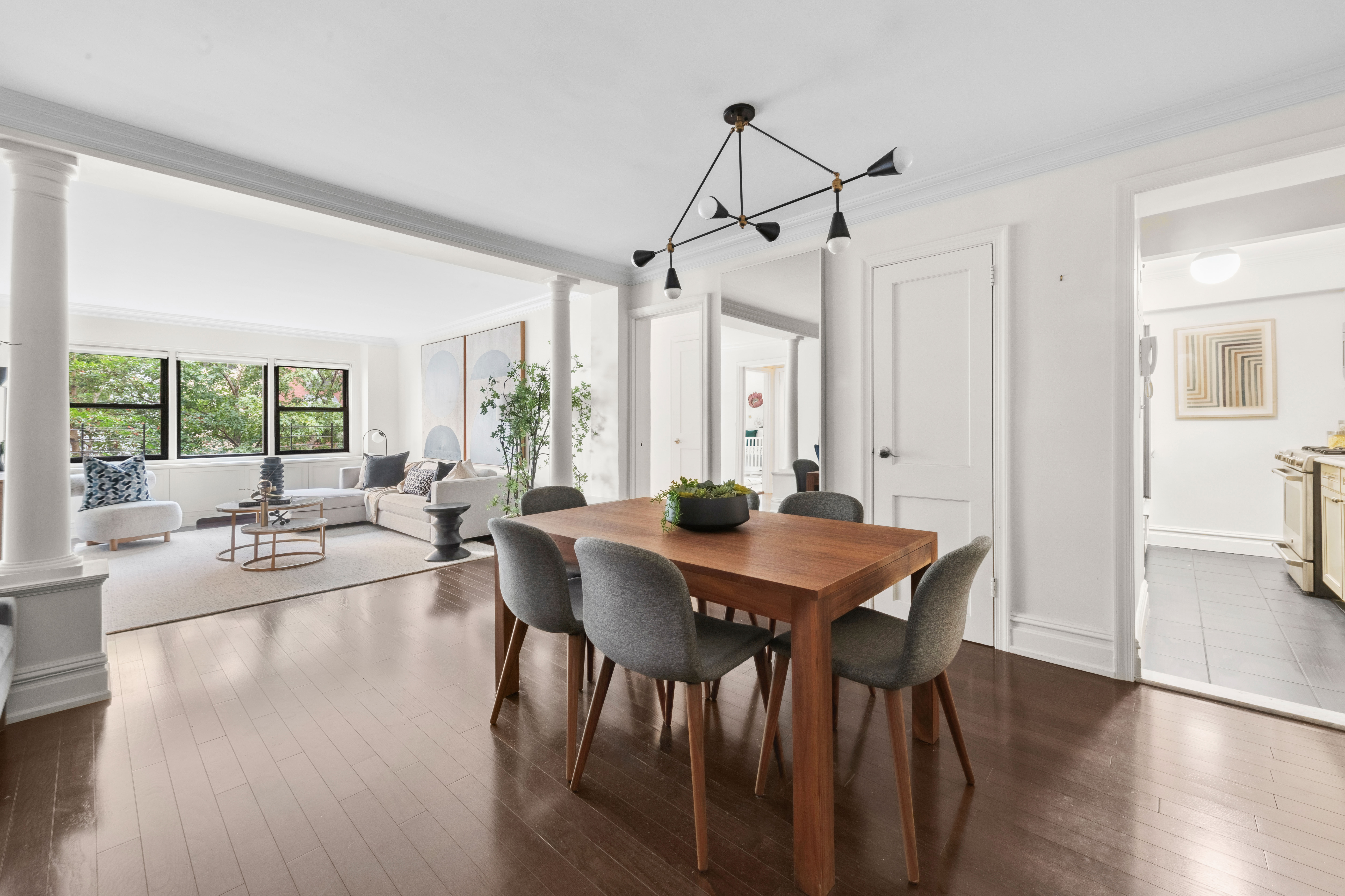 205 East 77th Street, Unit 3A Manhattan, NY 10075 - Photo 2 of 9 a view of a dining room with furniture window and wooden floor