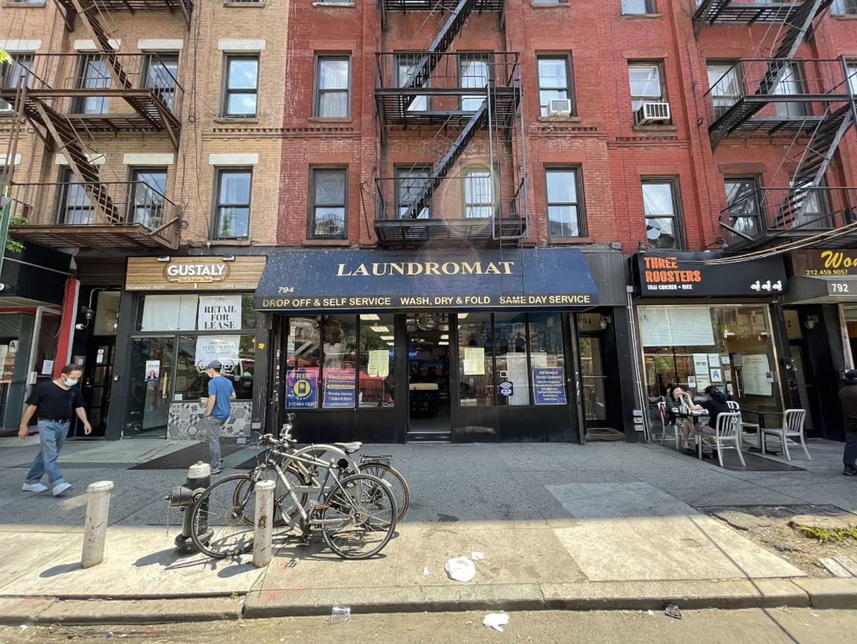 236 West 52nd Street, Unit B1 Manhattan, NY 10019 - Photo 9 of 15 a view of a building with a outdoor space