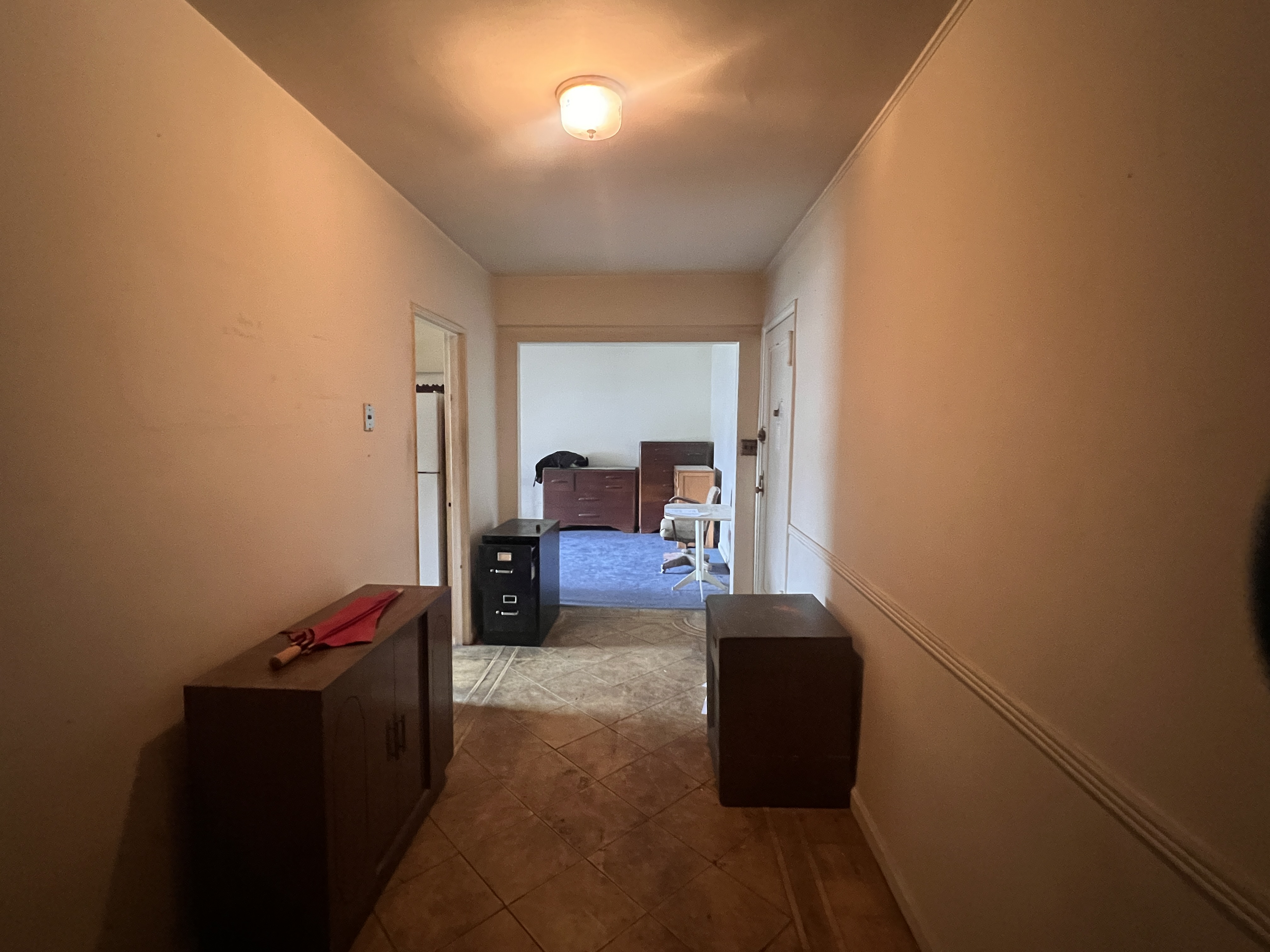 2251 Knapp Street, Unit 1C Brooklyn, NY 11229 - Photo 7 of 12 a living room with furniture and a window