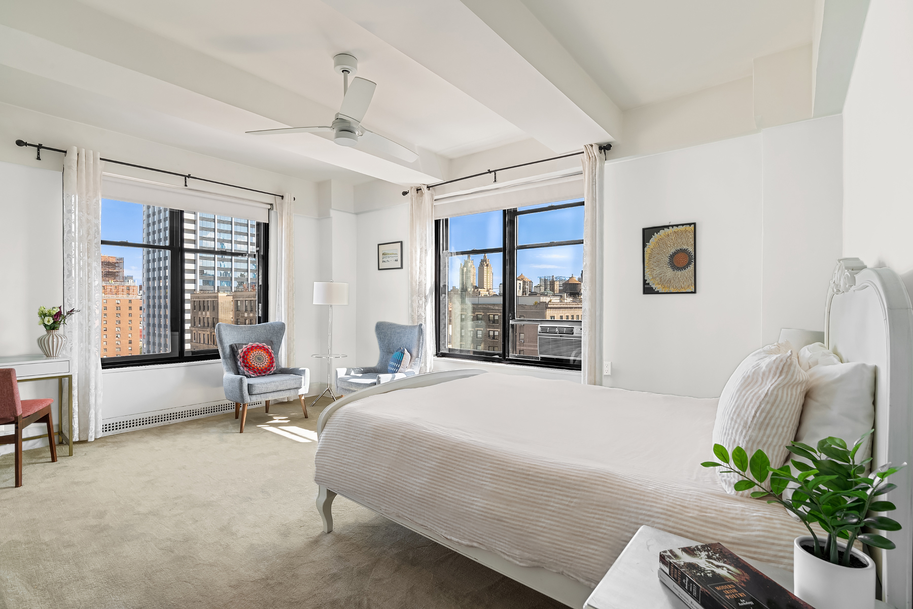 200 West 86th Street, Unit 17C Manhattan, NY 10024 - Photo 5 of 15 a bedroom with a bed couch and windows