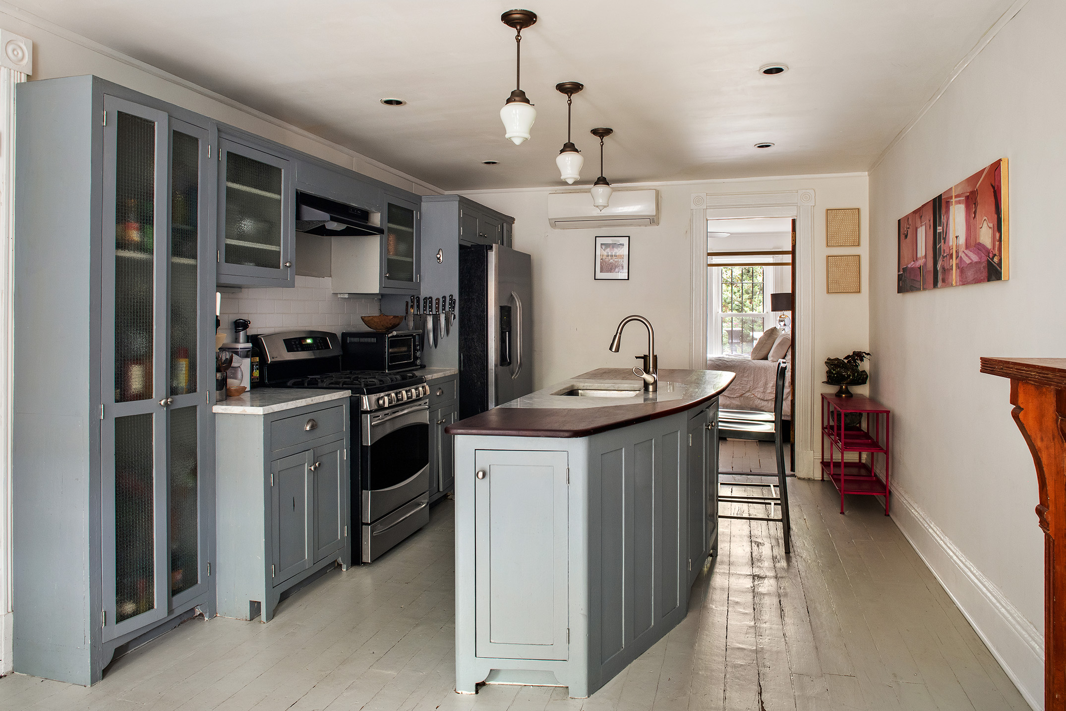 183 Halsey Street Brooklyn, NY 11216 - Photo 19 of 23 a kitchen with a sink stove and refrigerator
