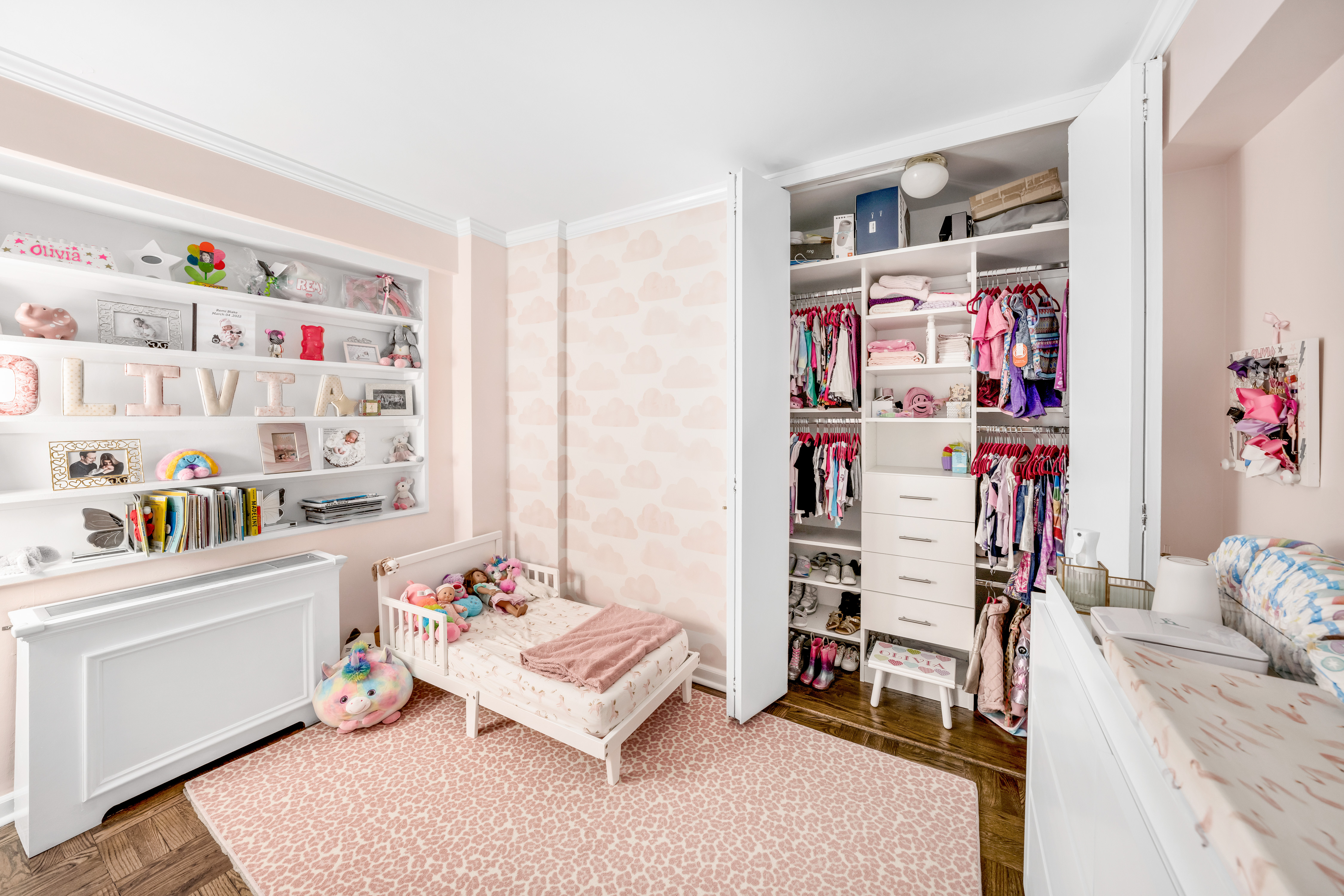 345 East 56th Street, Unit 11C Manhattan, NY 10022 - Photo 9 of 15 a bedroom with a bed and a closet