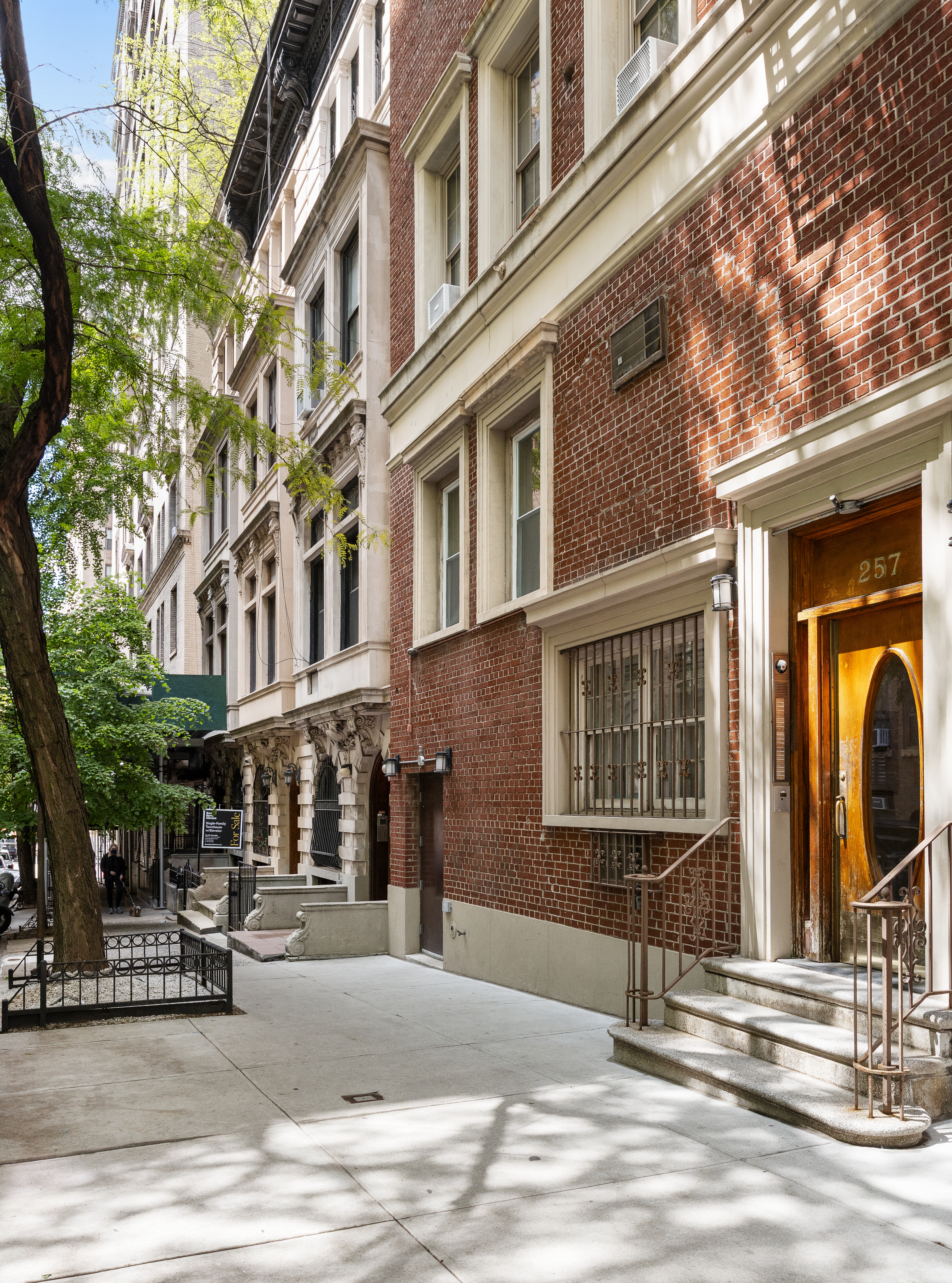 257 West 93rd Street, Unit 3C Manhattan, NY 10025 - Photo 19 of 20 a view of a building with car parked