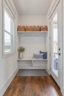 a kitchen with a stove and a refrigerator