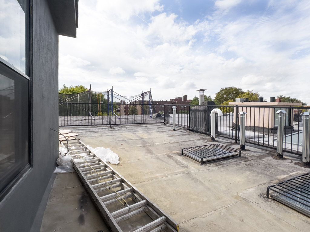 795 Quincy Street Brooklyn, NY 11221 - Photo 16 of 17 a terrace with a city view