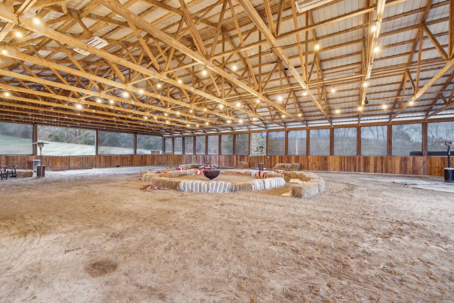 a view of a chairs and table in the parking space
