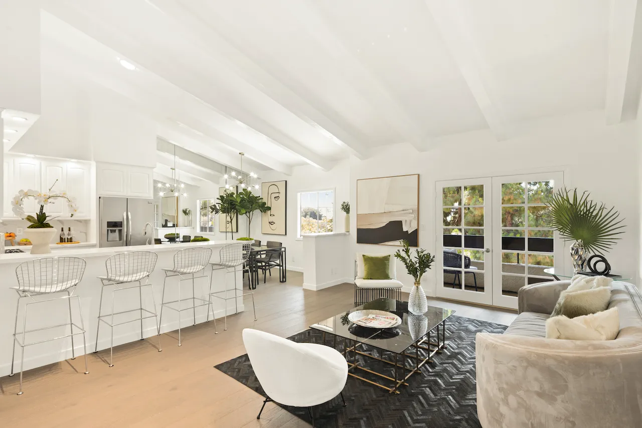 a living room with furniture and a table