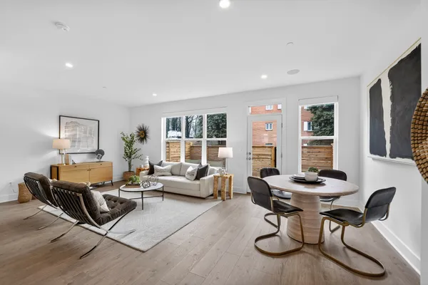 a living room with furniture and a table