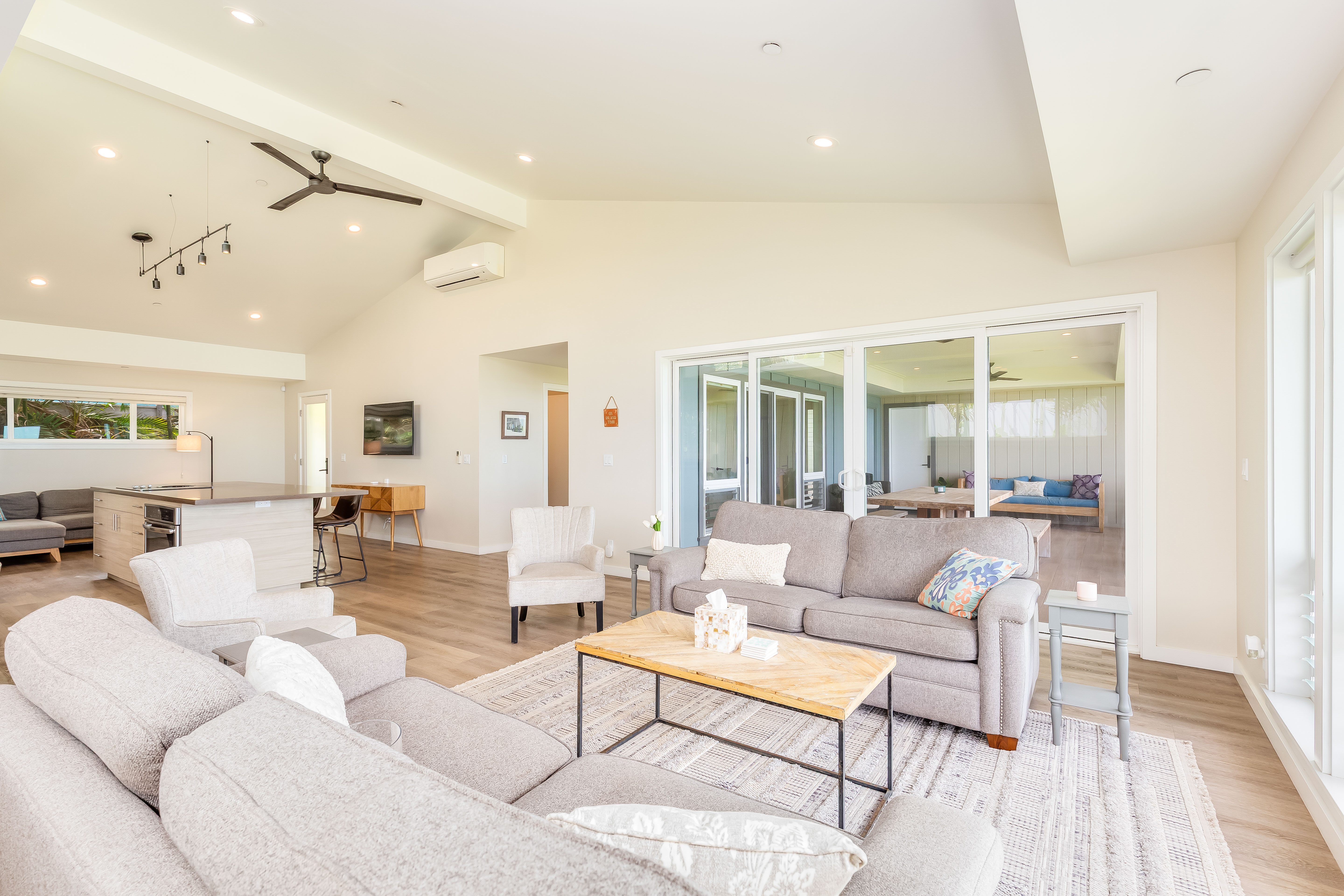 87-849 Farrington Highway, Unit C Waianae, HI 96792 - Photo 4 of 26 a living room with furniture and a wooden floor