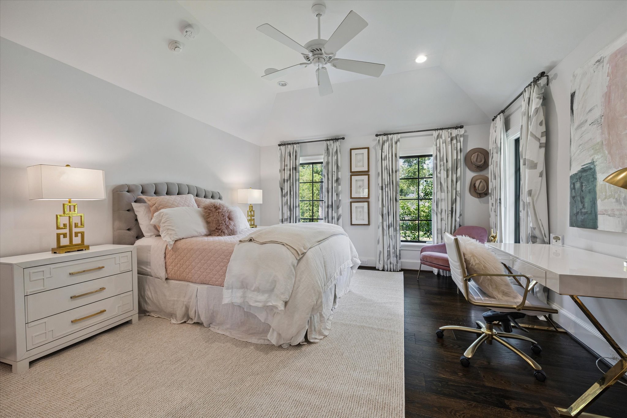 310 Longwoods Lane Houston, TX 77024 - Photo 32 of 49 a bedroom with furniture and large windows