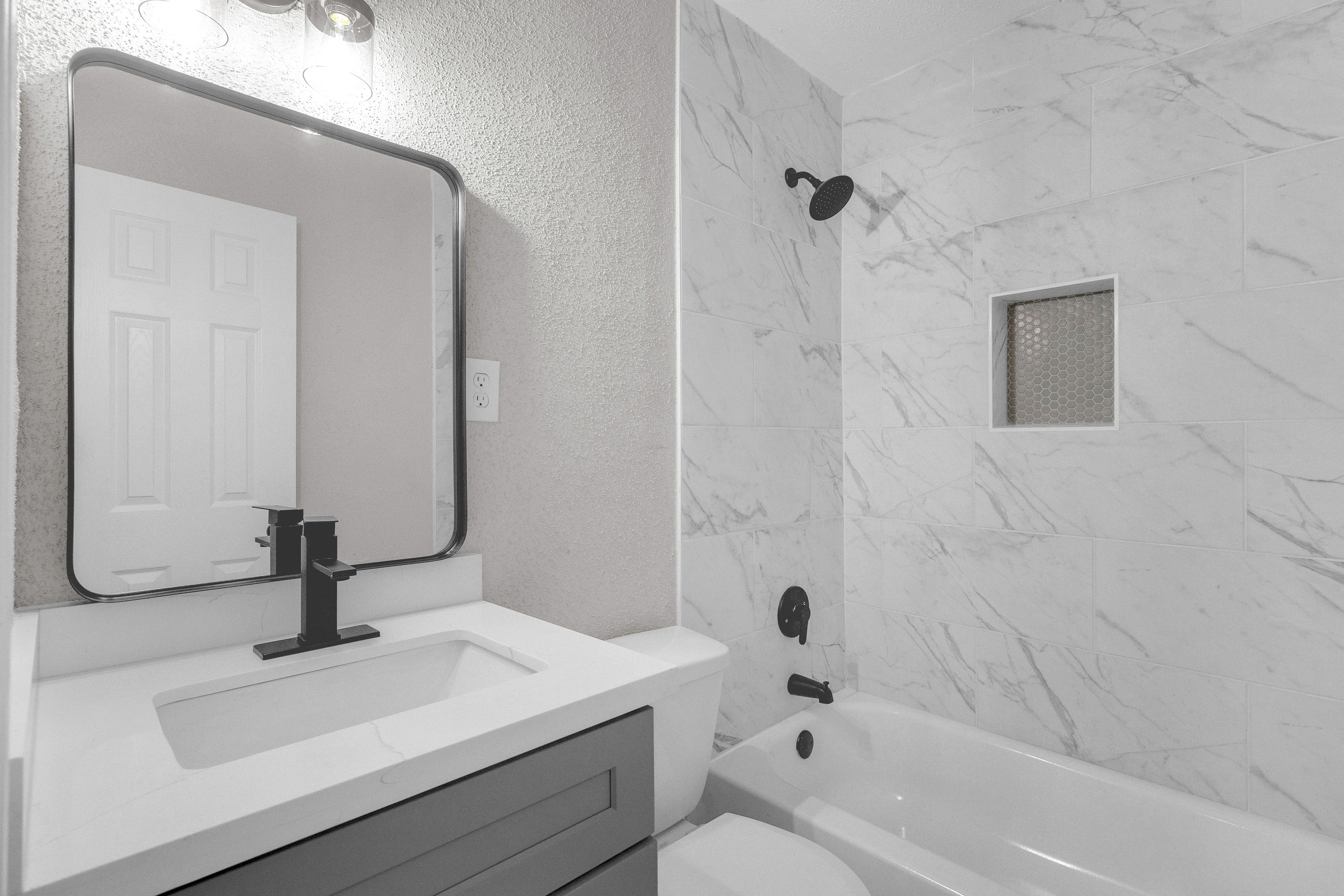 4755 Wilmington Street, Unit 6 Houston, TX 77033 - Photo 12 of 15 a bathroom with a sink a toilet and shower