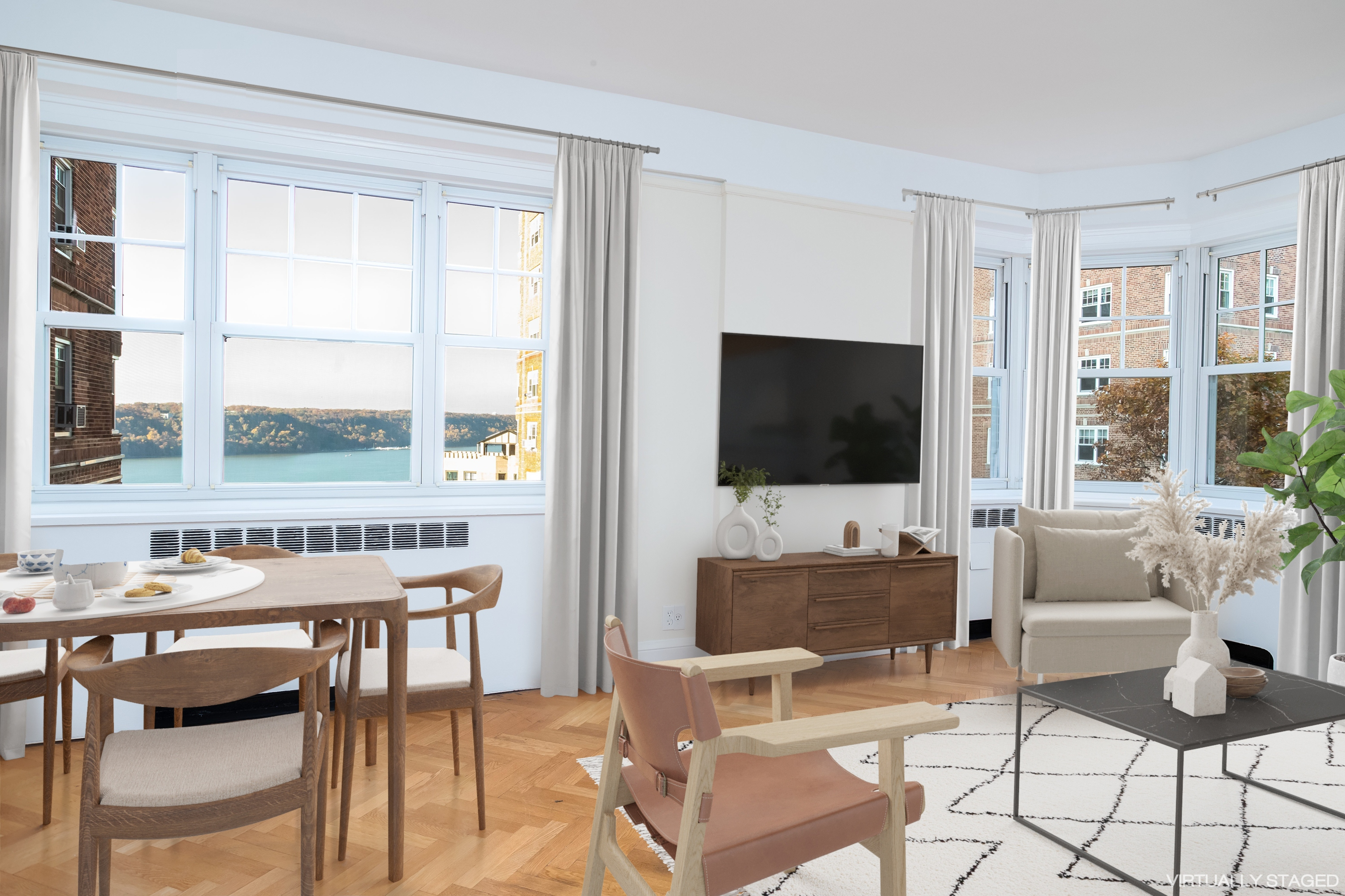 180 Cabrini Boulevard, Unit 37 Manhattan, NY 10033 - Photo 3 of 35 a living room with furniture and a flat screen tv