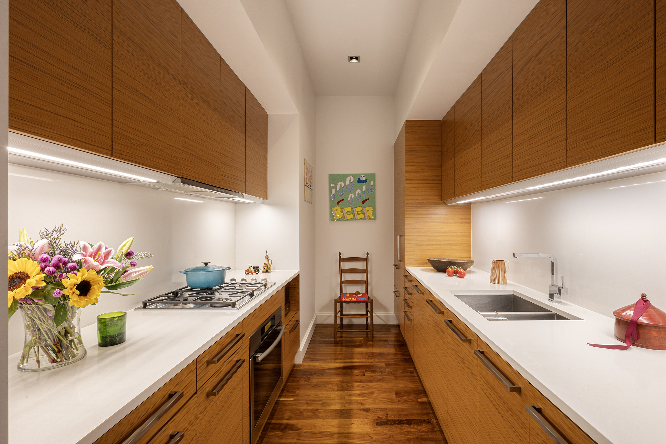 140 West 22nd Street, Unit 5D Manhattan, NY 10011 - Photo 3 of 10 a kitchen with stainless steel appliances lots of counter top space