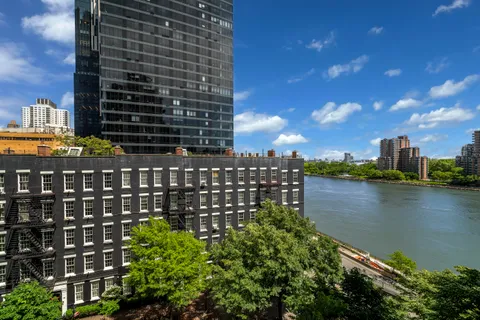 a view of a city with tall buildings