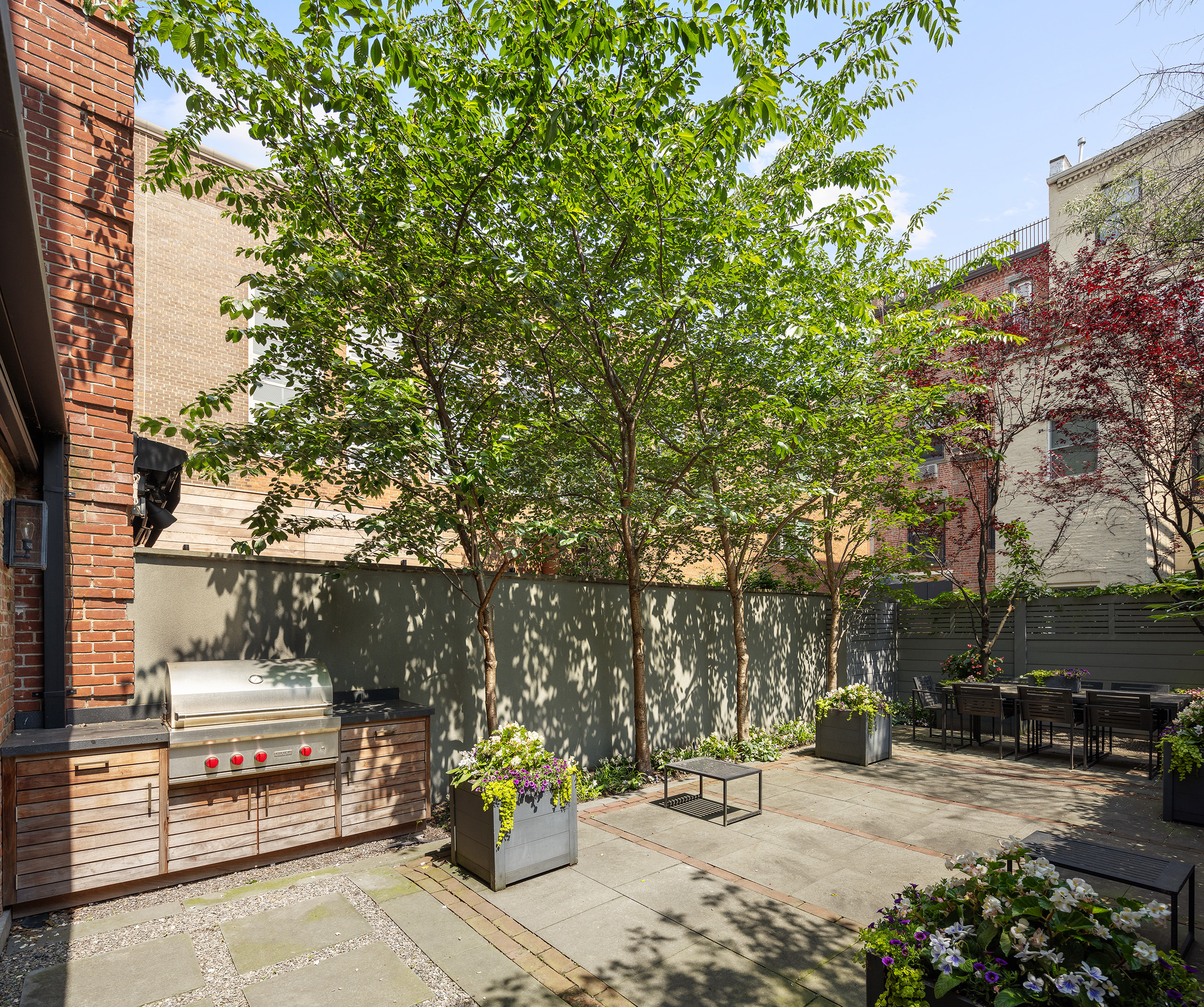 135 West 77th Street Manhattan, NY 10024 - Photo 5 of 32 a view of a bench in a parking area