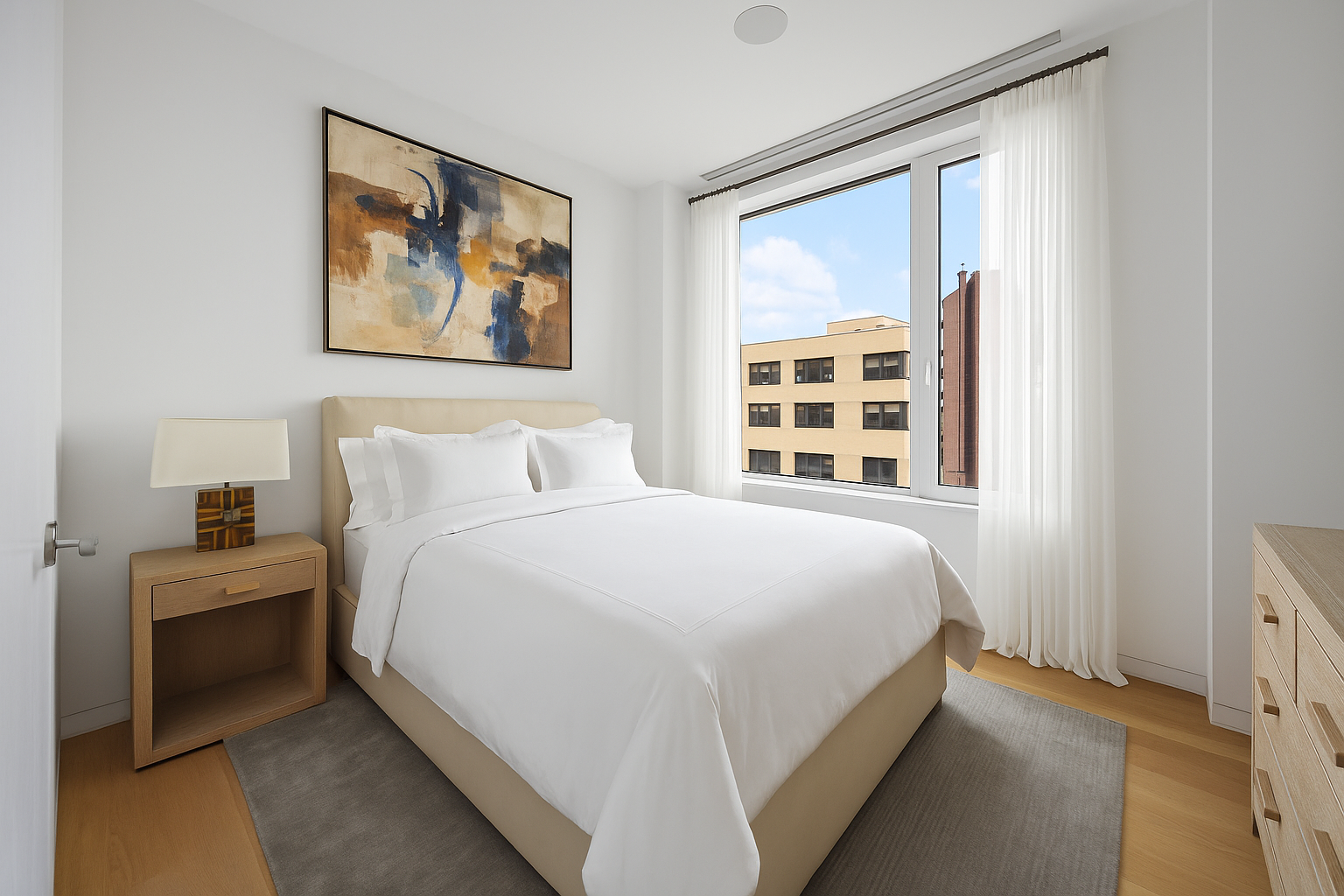 350 West Broadway, Unit 7FL Manhattan, NY 10013 - Photo 13 of 17 a bedroom with a bed and a window