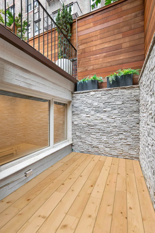 a view of a backyard of the house