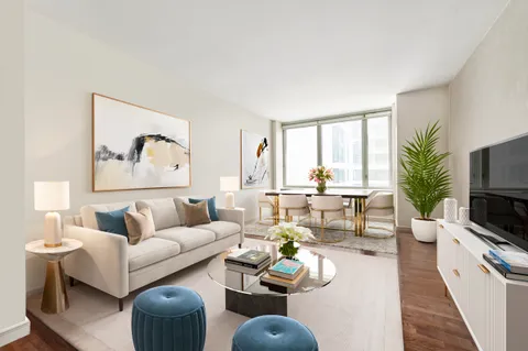 a living room with furniture or couch and a flat screen tv