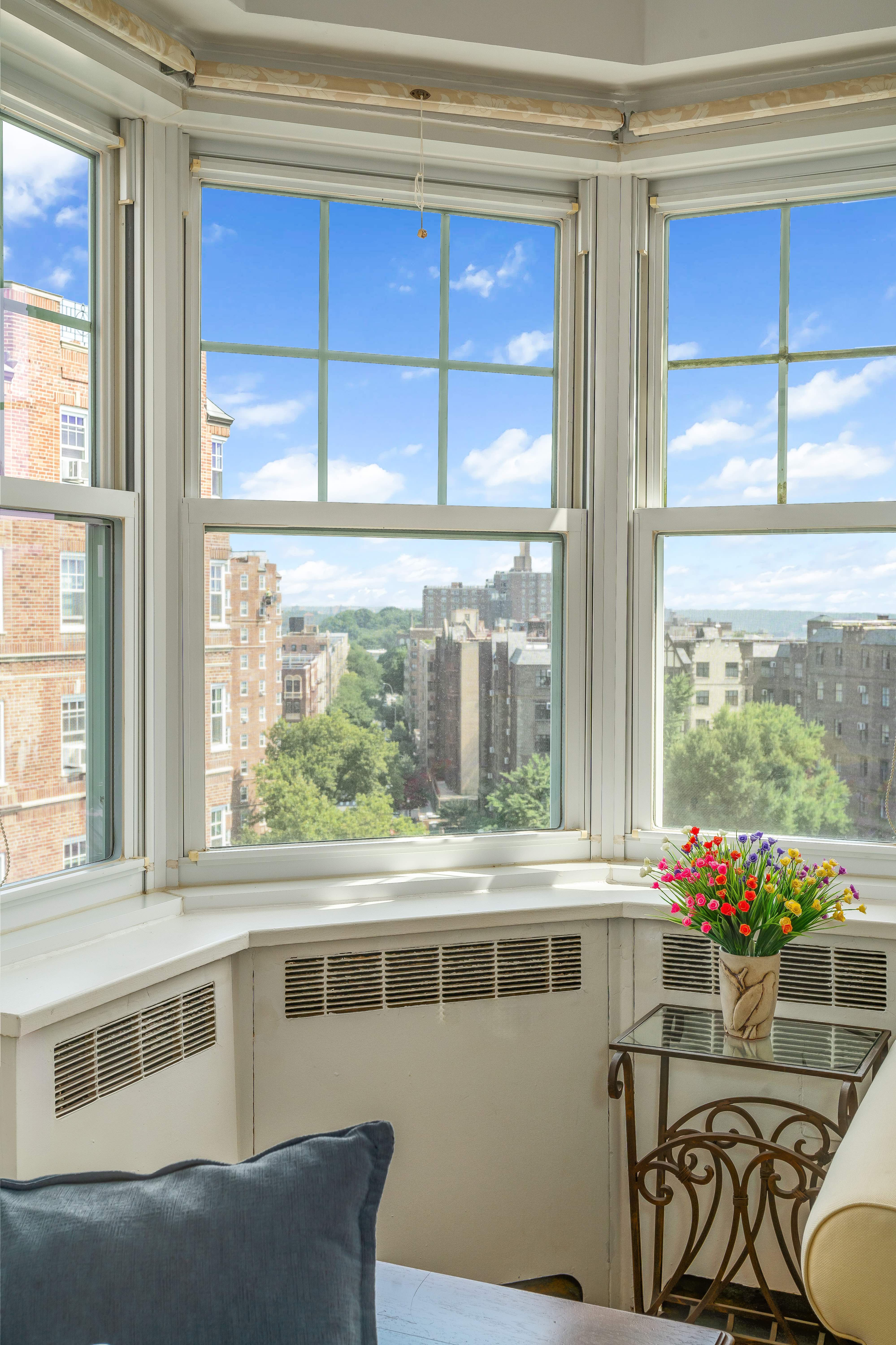 140 Cabrini Boulevard, Unit 136 Manhattan, NY 10033 - Photo 2 of 33 a view of a dining room with furniture window and outside view
