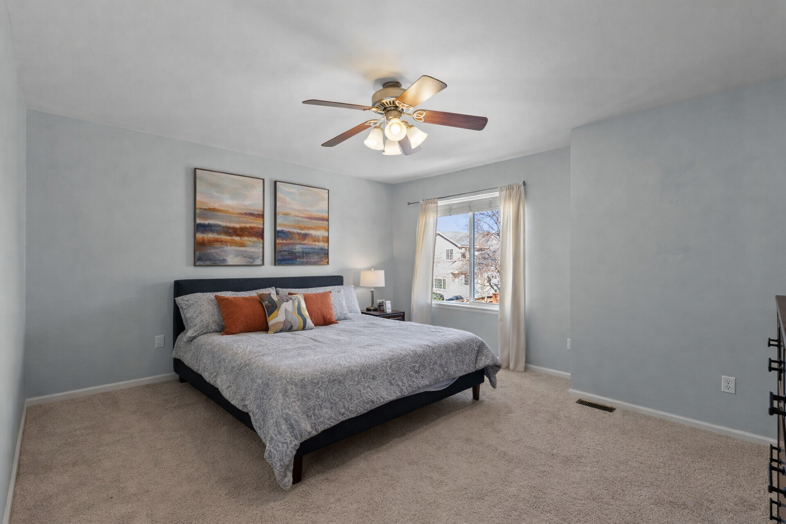 847 Timbervale Trail Highlands Ranch, CO 80129 - Photo 20 of 36 a bedroom with a bed and window