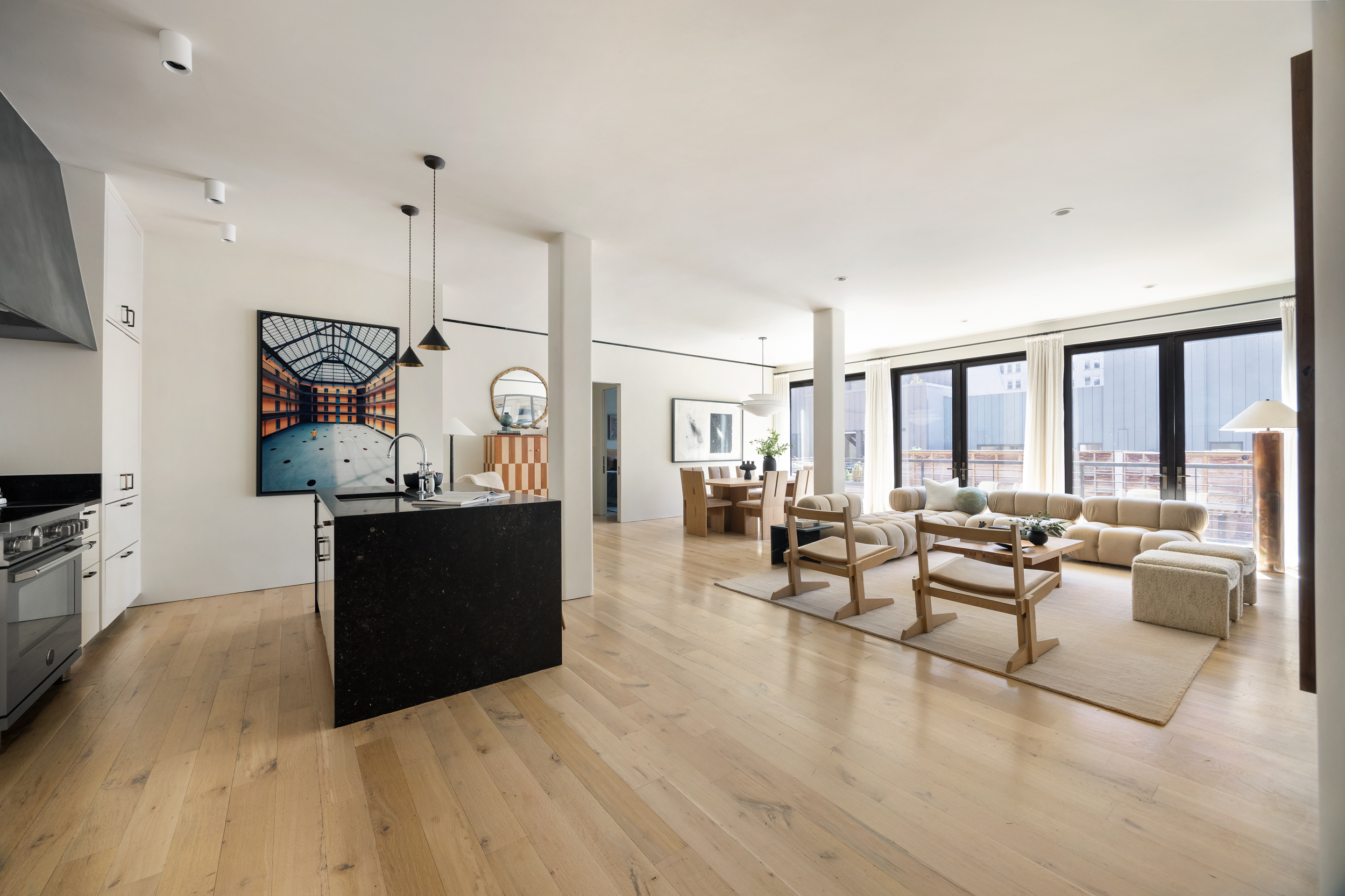 110 Duane Street, Unit PH3S Manhattan, NY 10007 - Photo 1 of 23 a living room with furniture large window and kitchen view