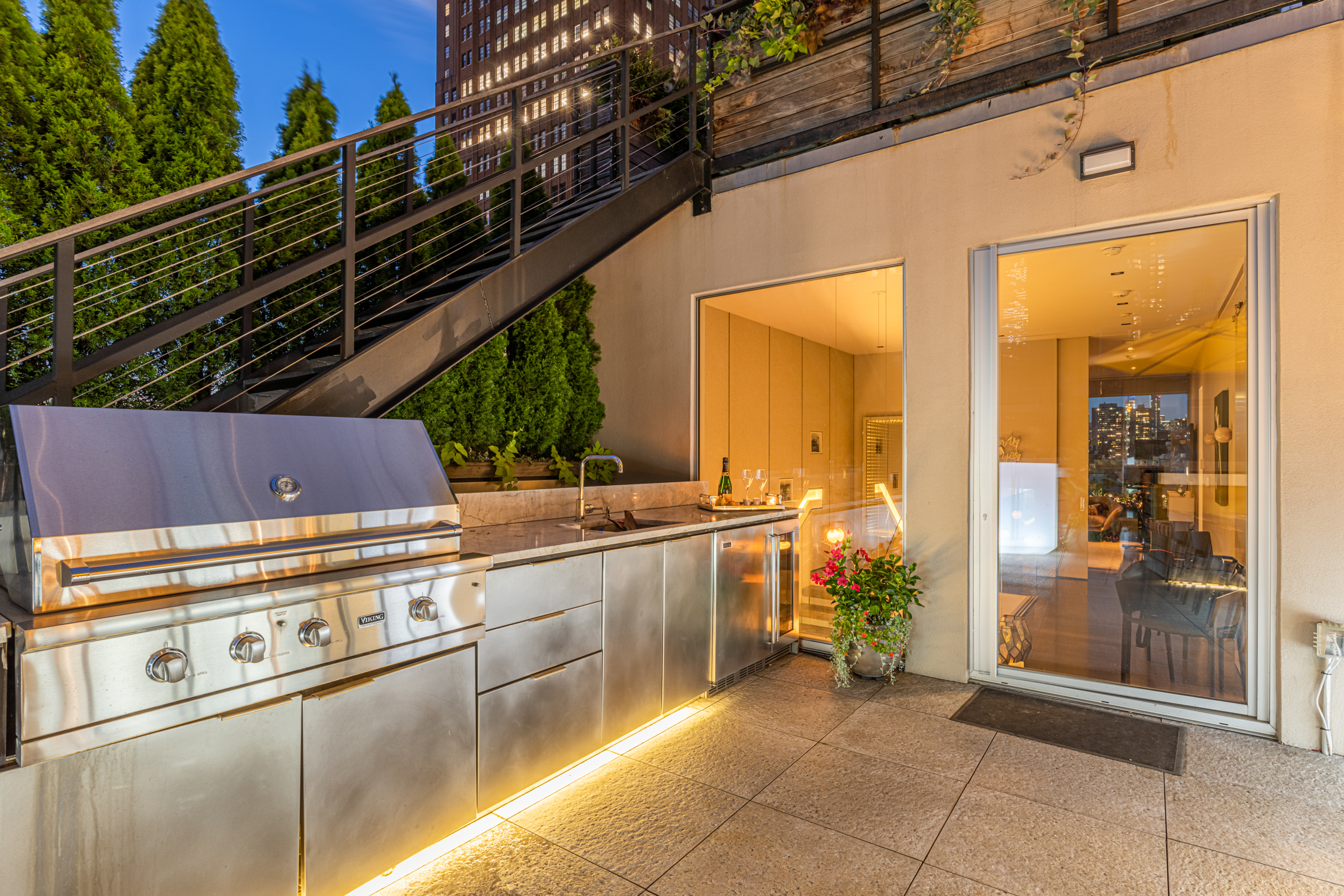 42 White Street, Unit PH Manhattan, NY 10013 - Photo 18 of 22 a view of a patio with a table and chairs