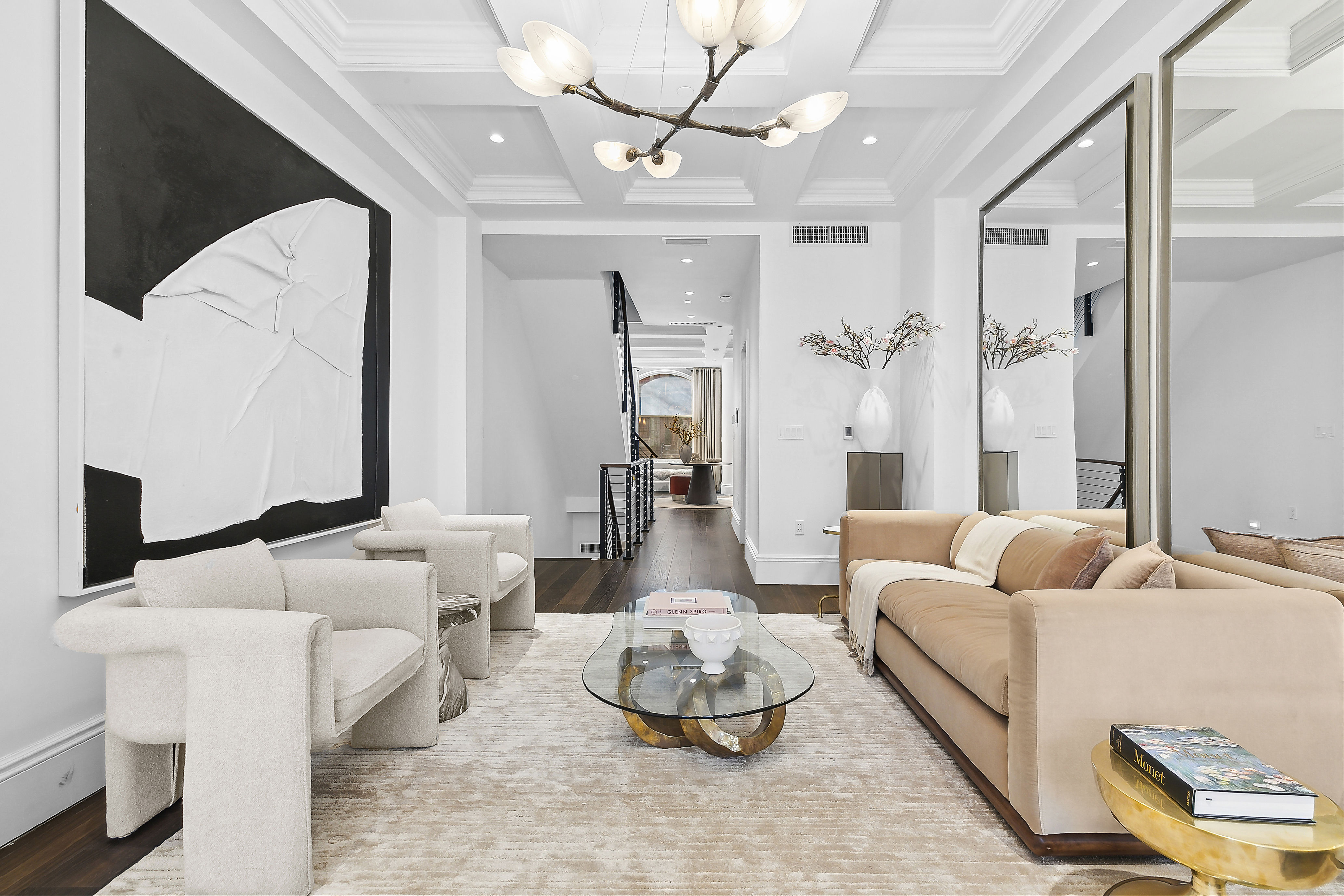 47 West 94th Street Manhattan, NY 10025 - Photo 4 of 20 a living room with furniture and a chandelier