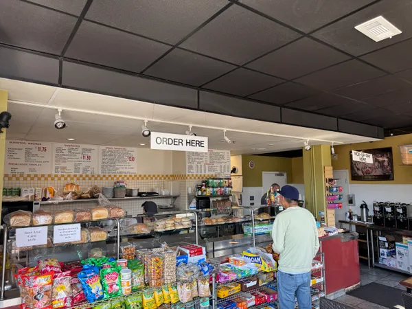 a room with lots of furniture and clutter