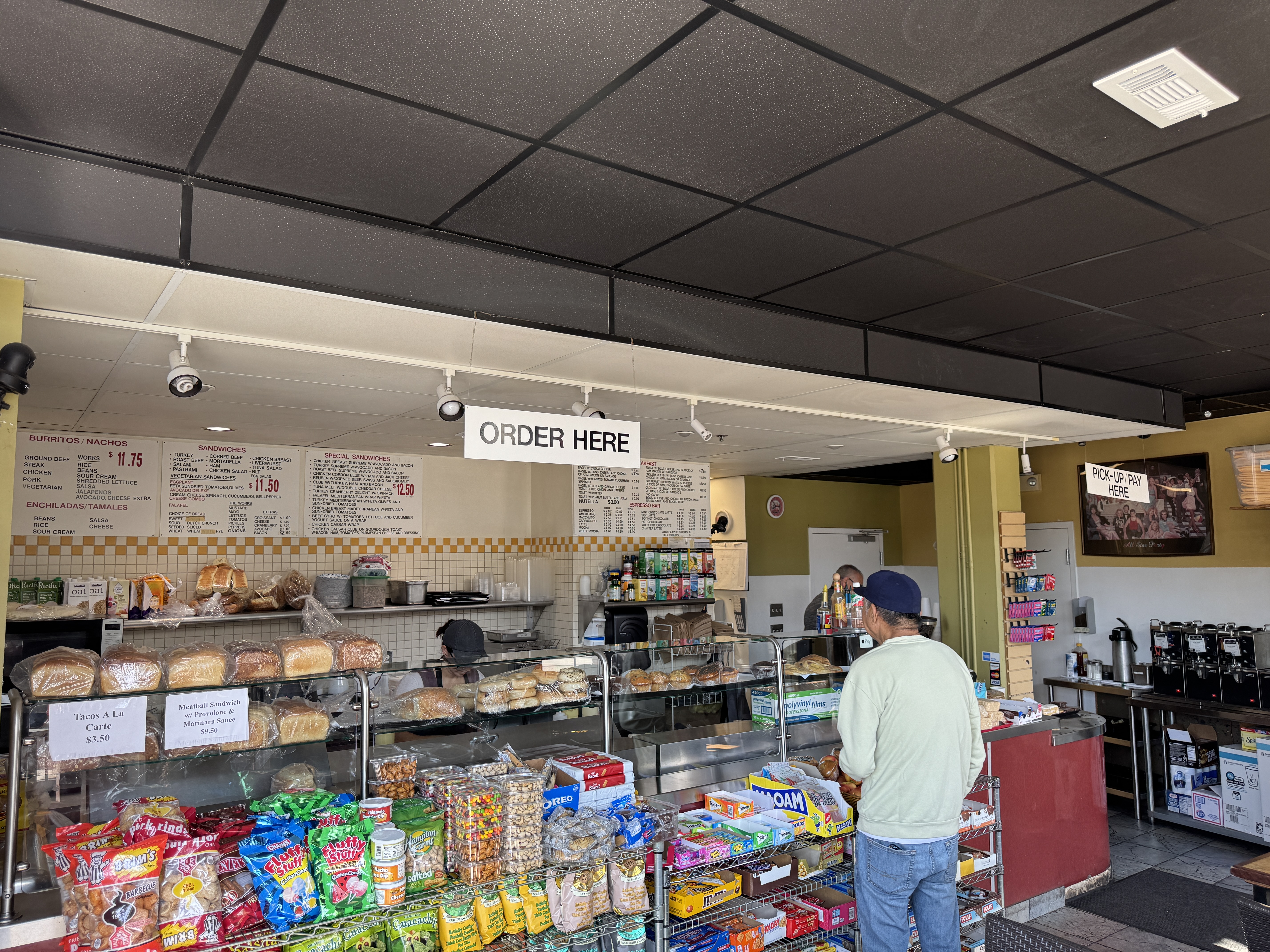1109 Oak Street Oakland, CA 94607 - Photo 15 of 22 a room with lots of furniture and clutter